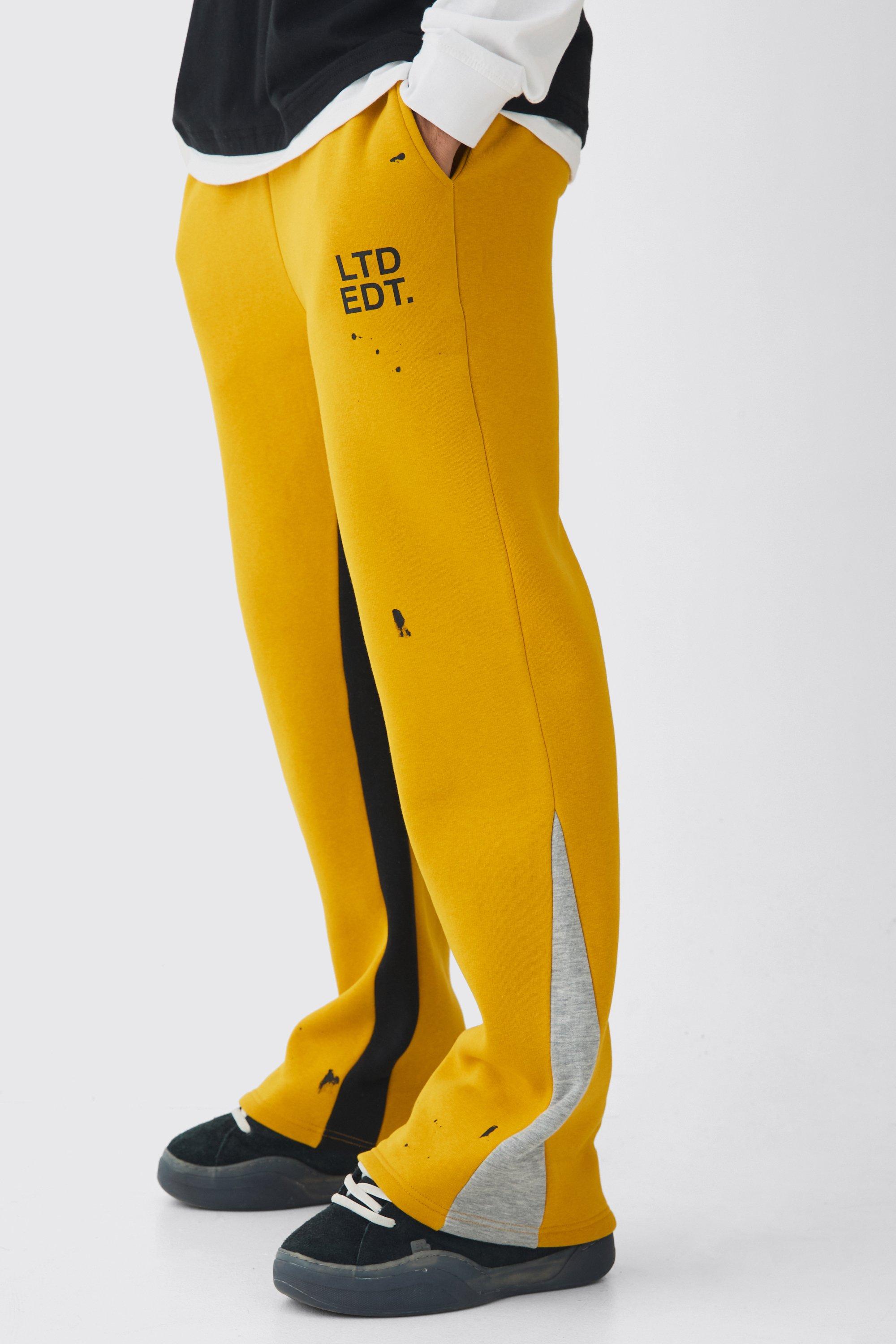 Pantaloni tuta Ofcl Man Regular Fit con inserti e schizzi di colore, Giallo