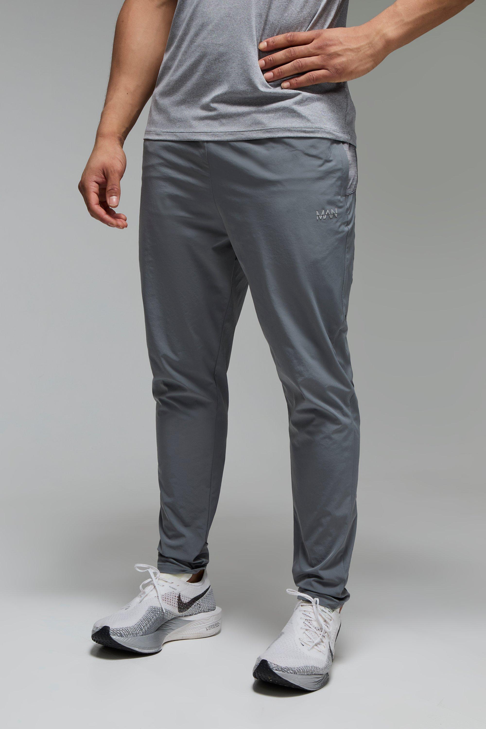 Pantaloni tuta affusolati Man Active in tessuto Stretch, Grigio