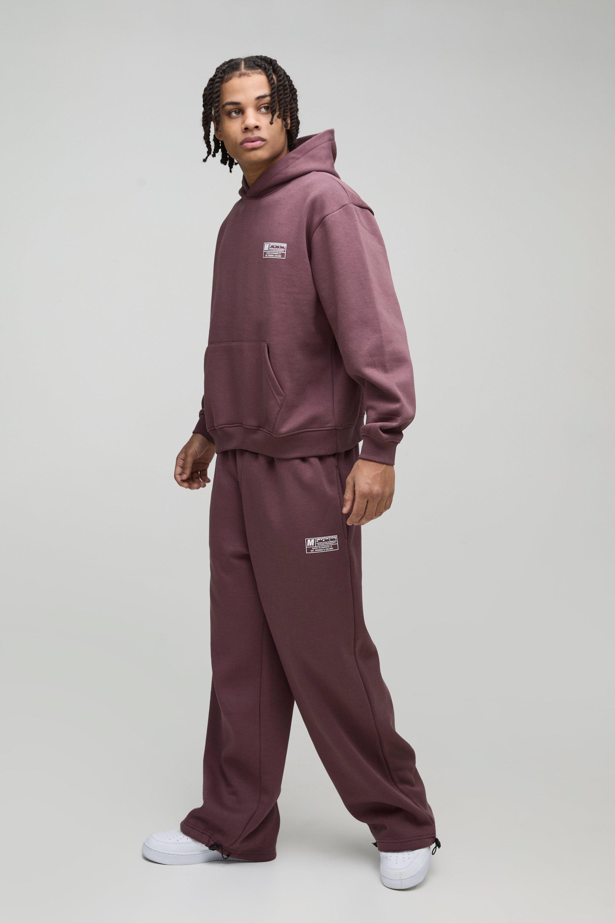 Tuta sportiva squadrata oversize con cappuccio & pantaloni a gamba ampia con laccetti sui polsini, Brown