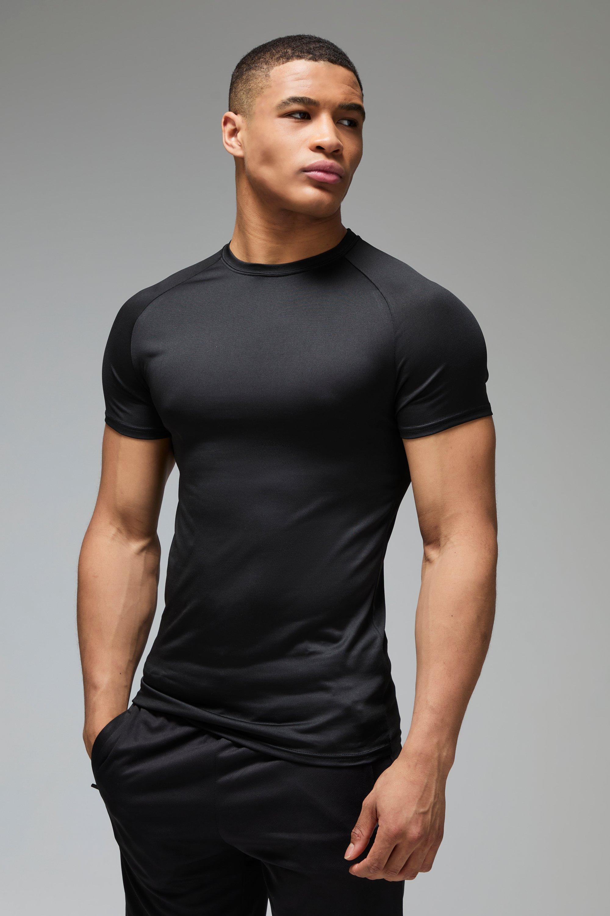 Image of T-shirt attillata leggera Man Active Essentials Gym con maniche raglan, Nero