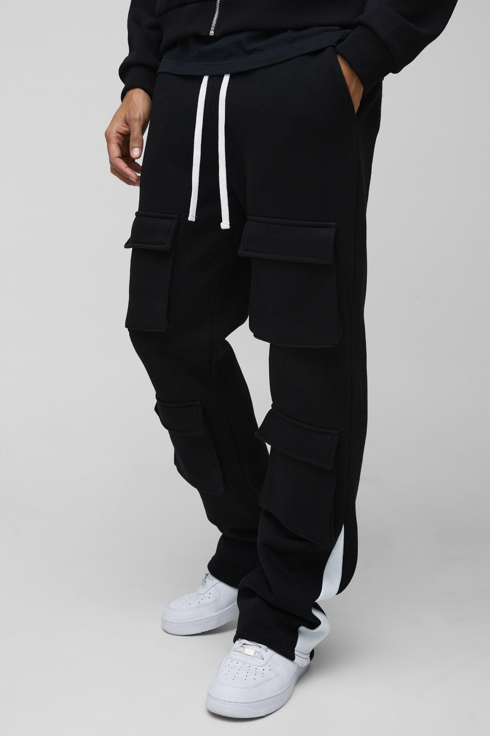 Pantaloni tuta Slim Fit con tasche a zampa, inserti e pieghe sul fondo, Nero