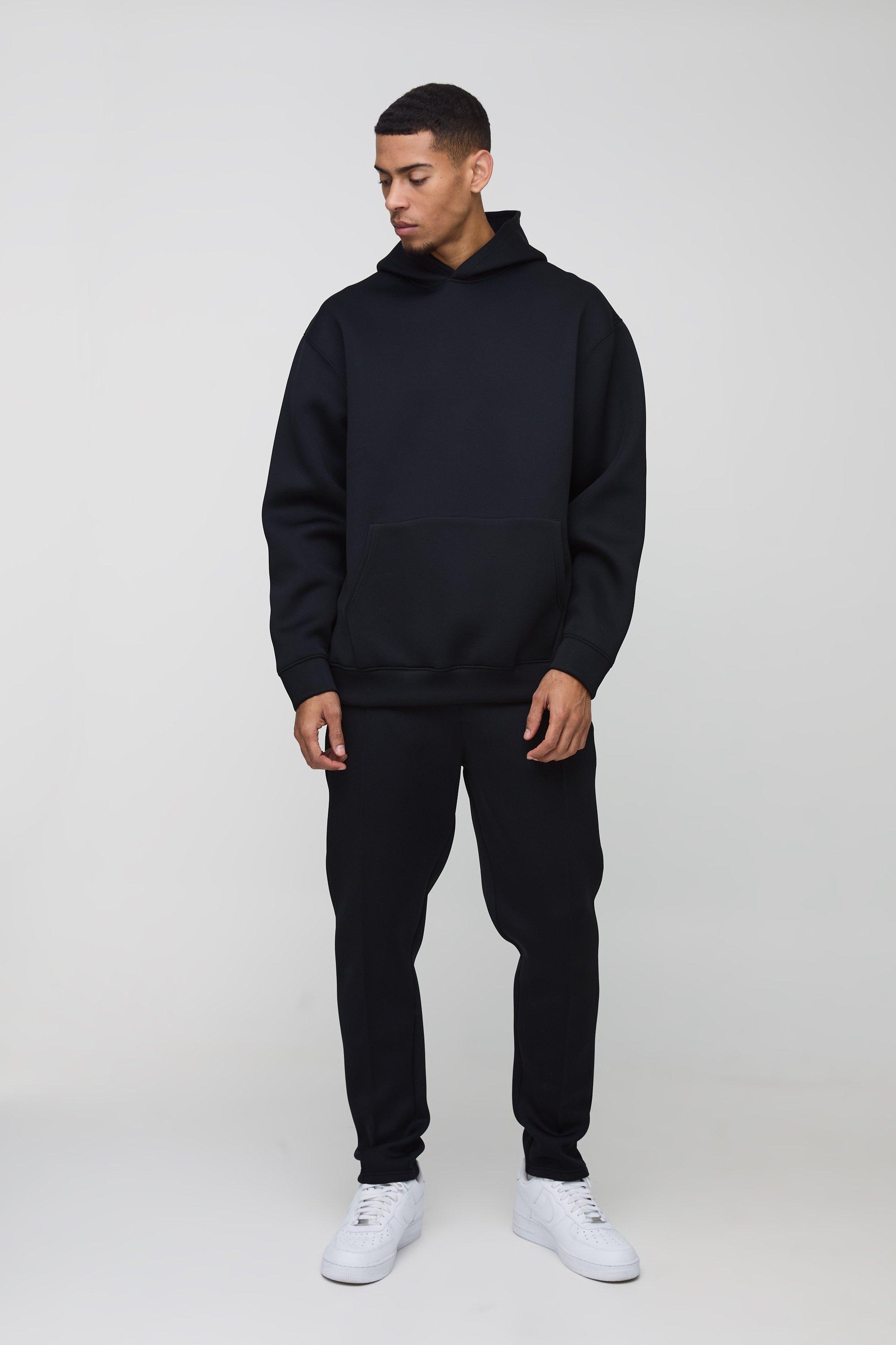 Tuta sportiva oversize in Scuba rivestito con cappuccio, Nero