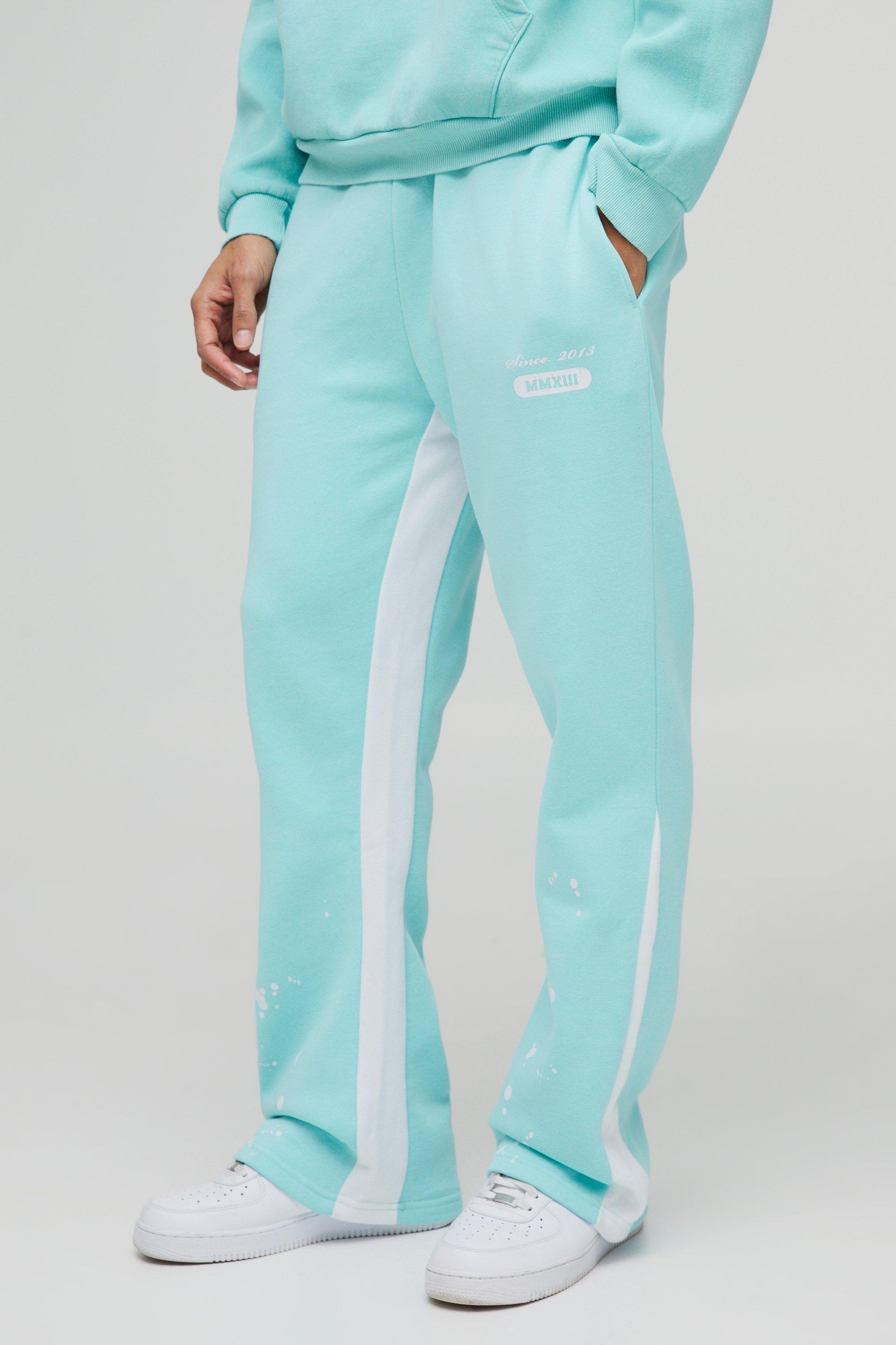 Pantaloni tuta Regular Fit con inserti e schizzi di colore, Azzurro