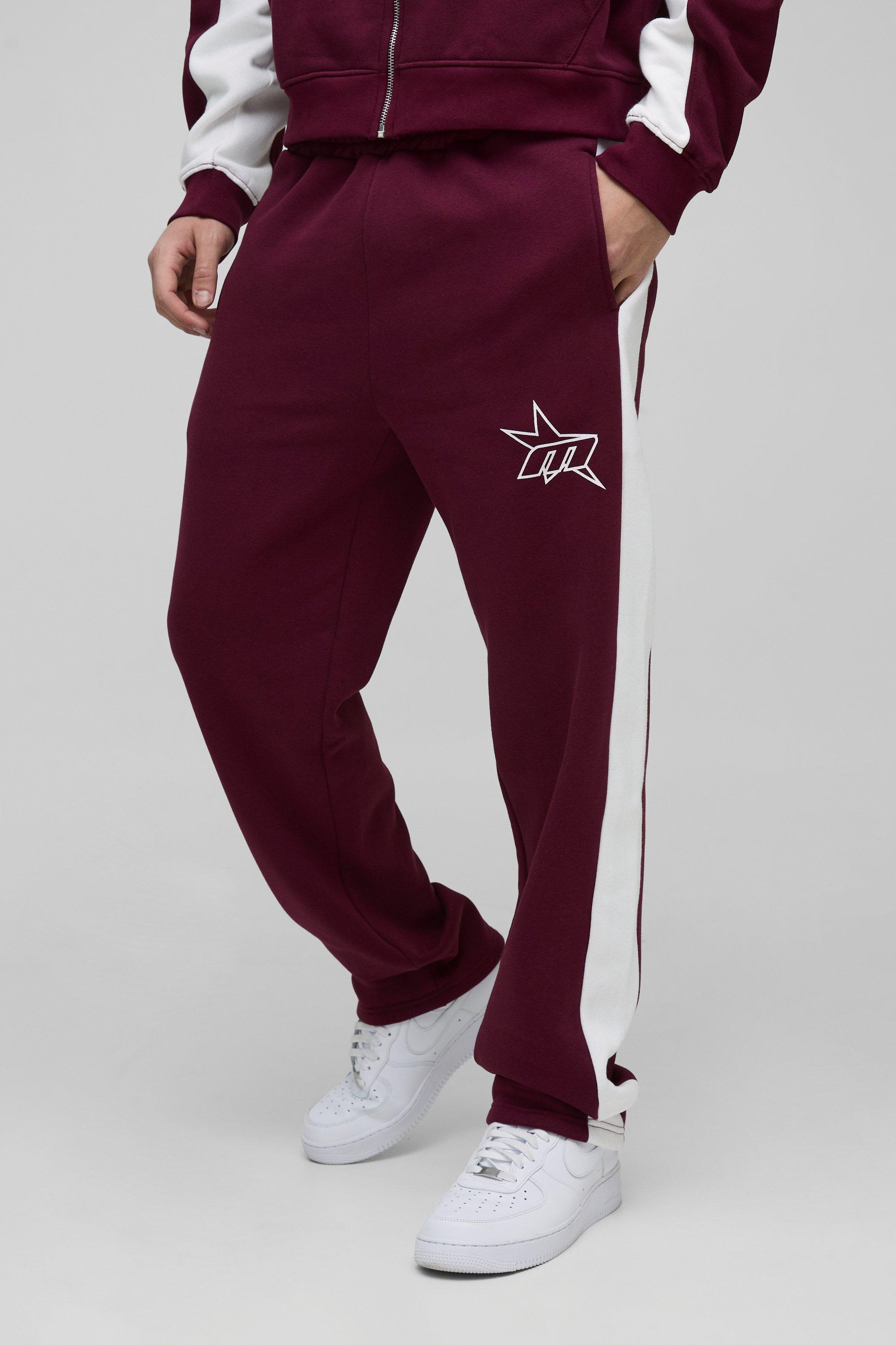 Pantaloni tuta Regular Fit con pannelli laterali e stella M, Rosso