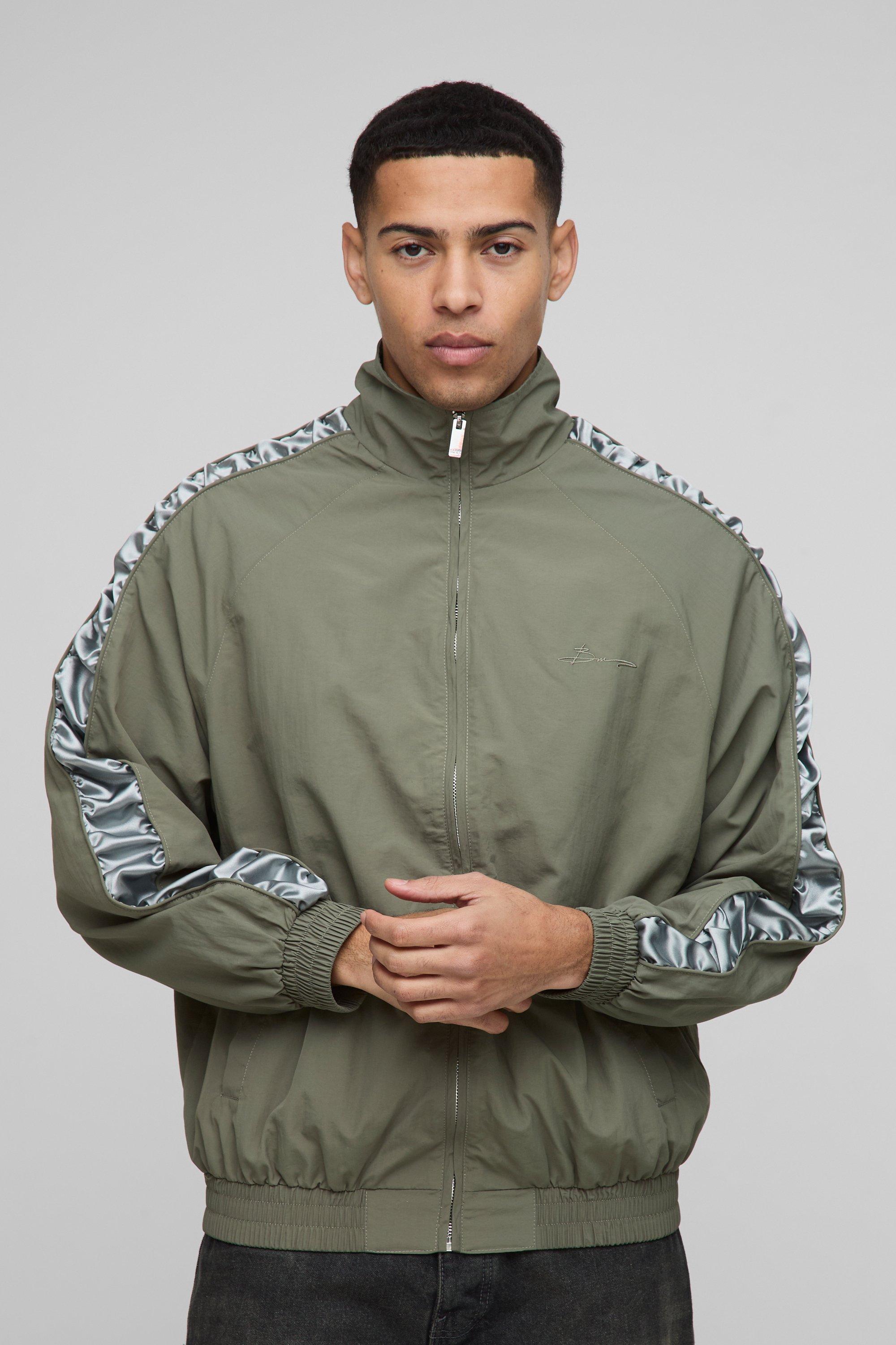 Image of Giacca da corsa Regular Fit in nylon con pannelli in raso e maniche con ruches, Verde
