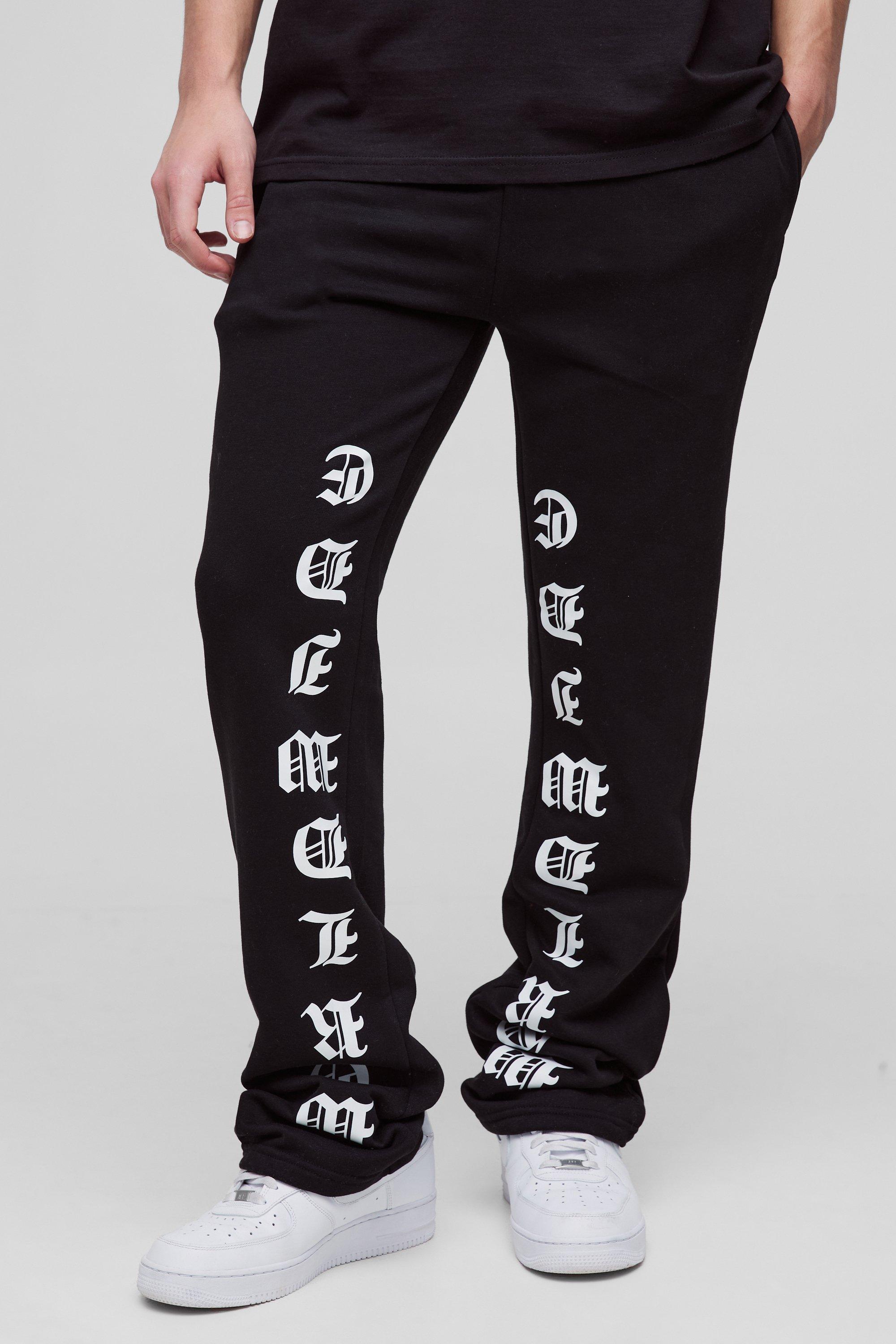 Pantaloni tuta a zampa Slim Fit con stampa e pieghe sul fondo, Nero