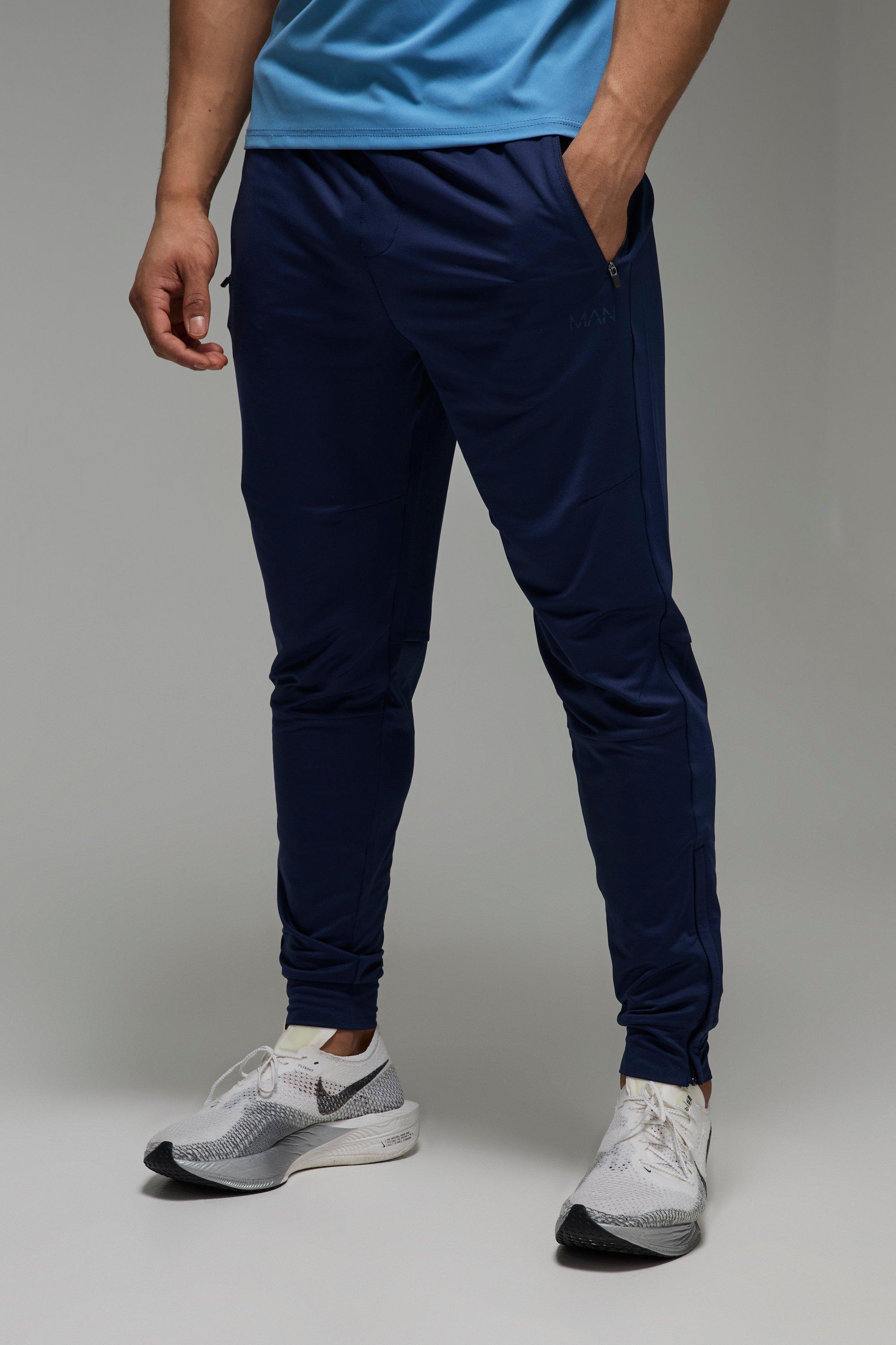 Pantaloni tuta affusolati Man Active Stretch con zip sul fondo, Tan