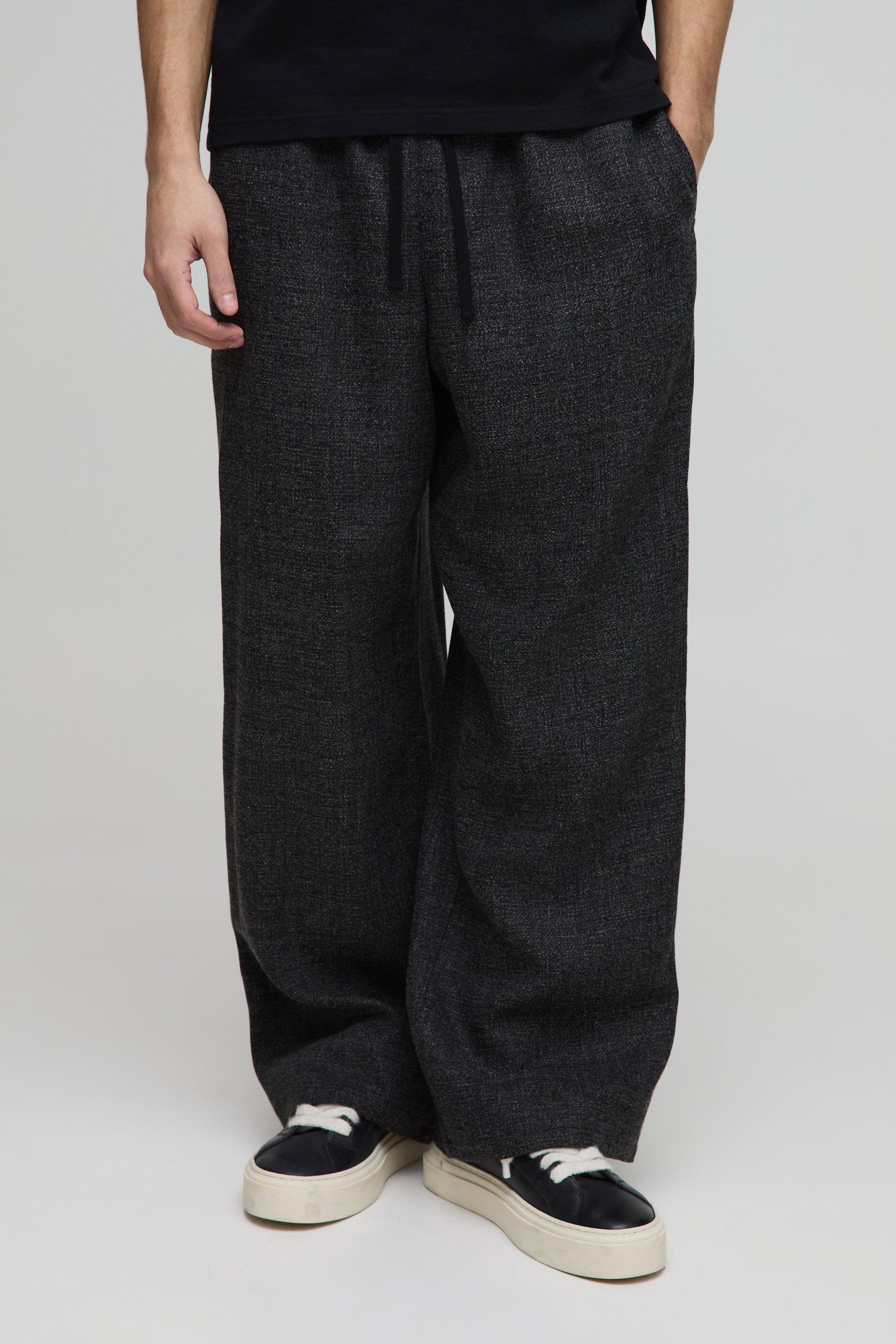Pantaloni a gamba ampia in bouclé elasticizzati, Nero