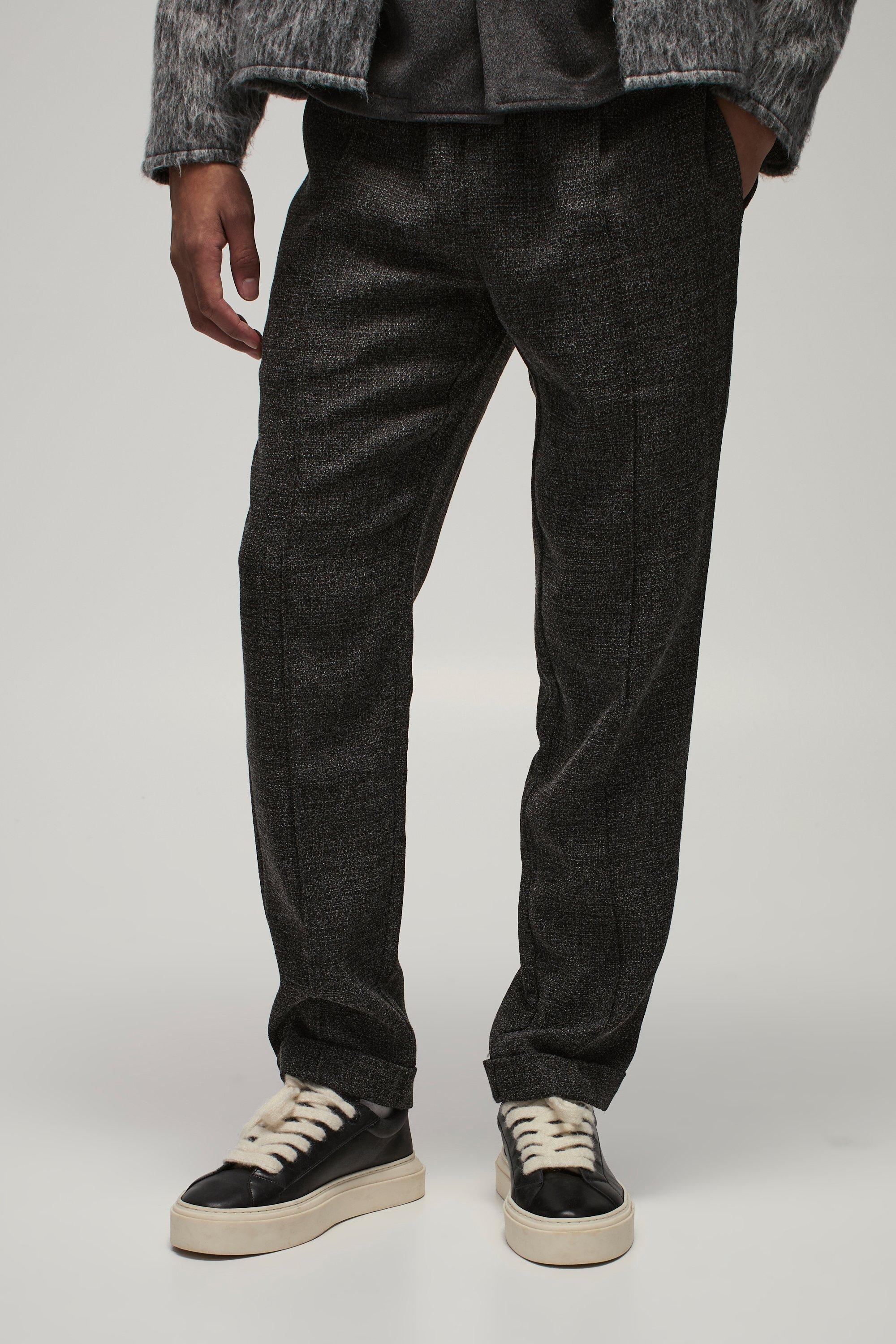 Pantaloni affusolati elasticizzati con nervature e risvolti sul fondo, Nero