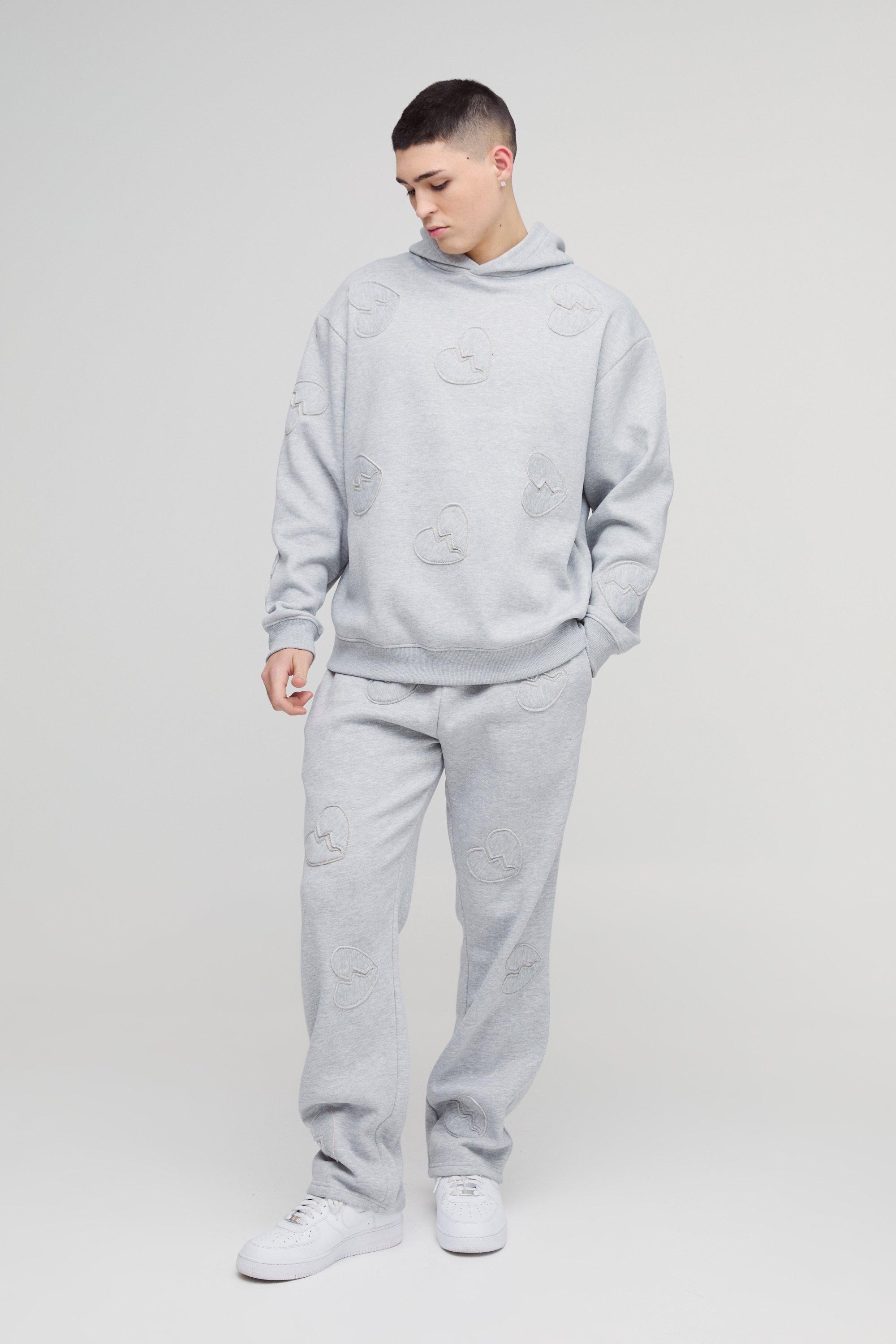 Tuta sportiva squadrata oversize con applique a cuore all over, Grigio