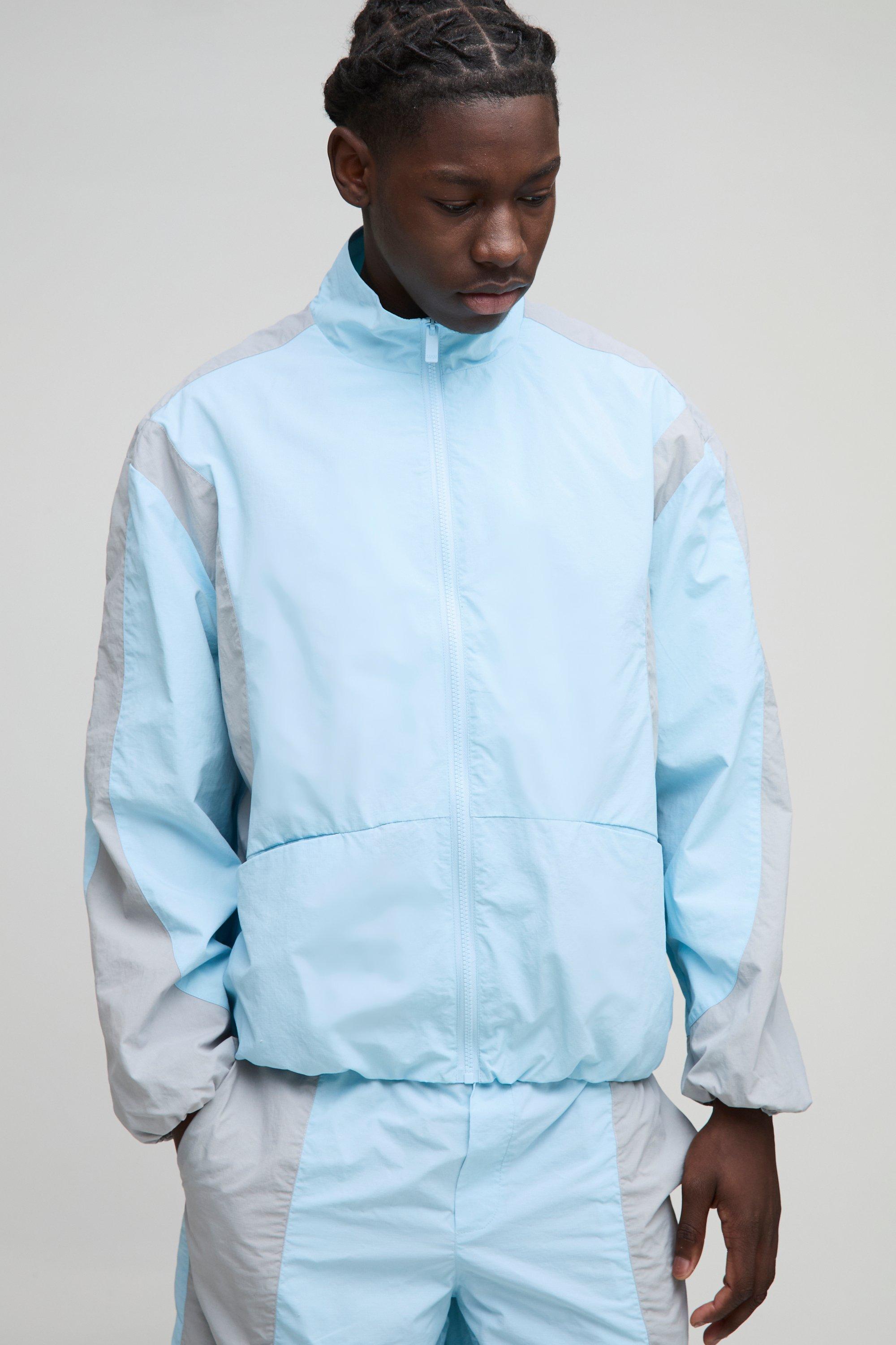 Mens Blue Regular Fit Ripstop Colour Block Funnel Neck Track Jacket, Blue