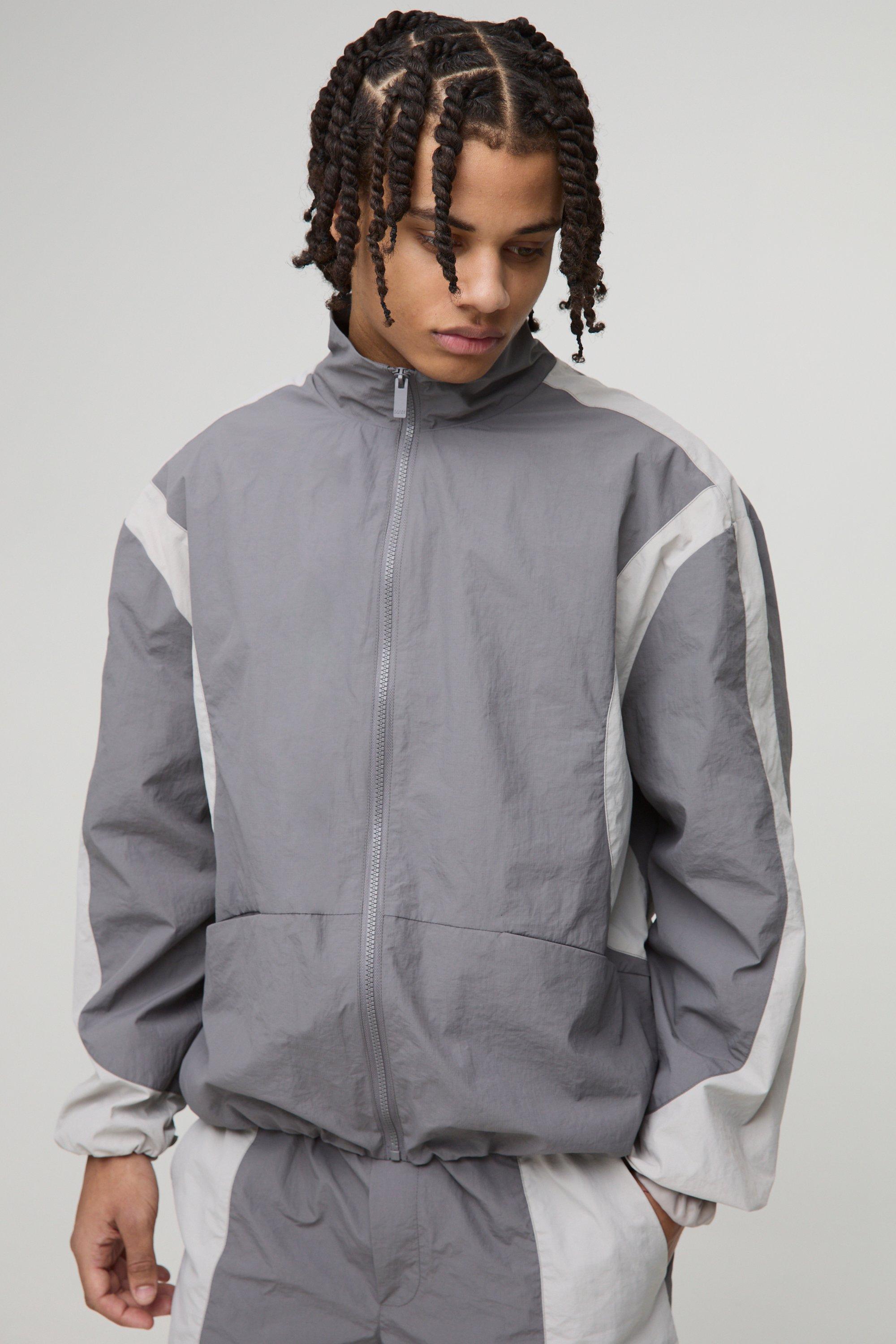Image of Giacca Da Corsa Regular Fit In Nylon Ripstop A Blocchi Di Colore Con Collo A Imbuto, Grigio