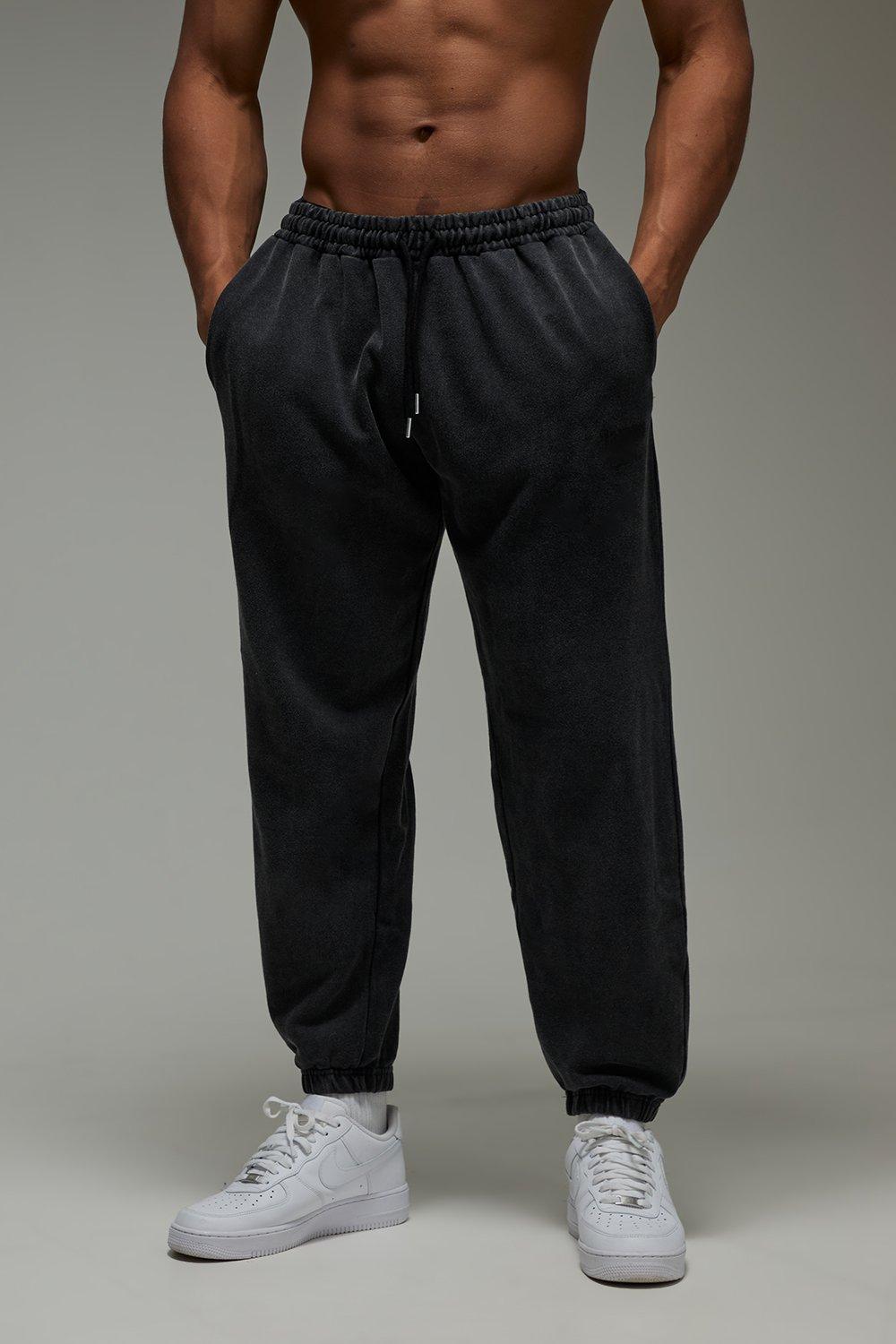 Image of Pantaloni tuta oversize slavati Man Active Training Dept, Nero