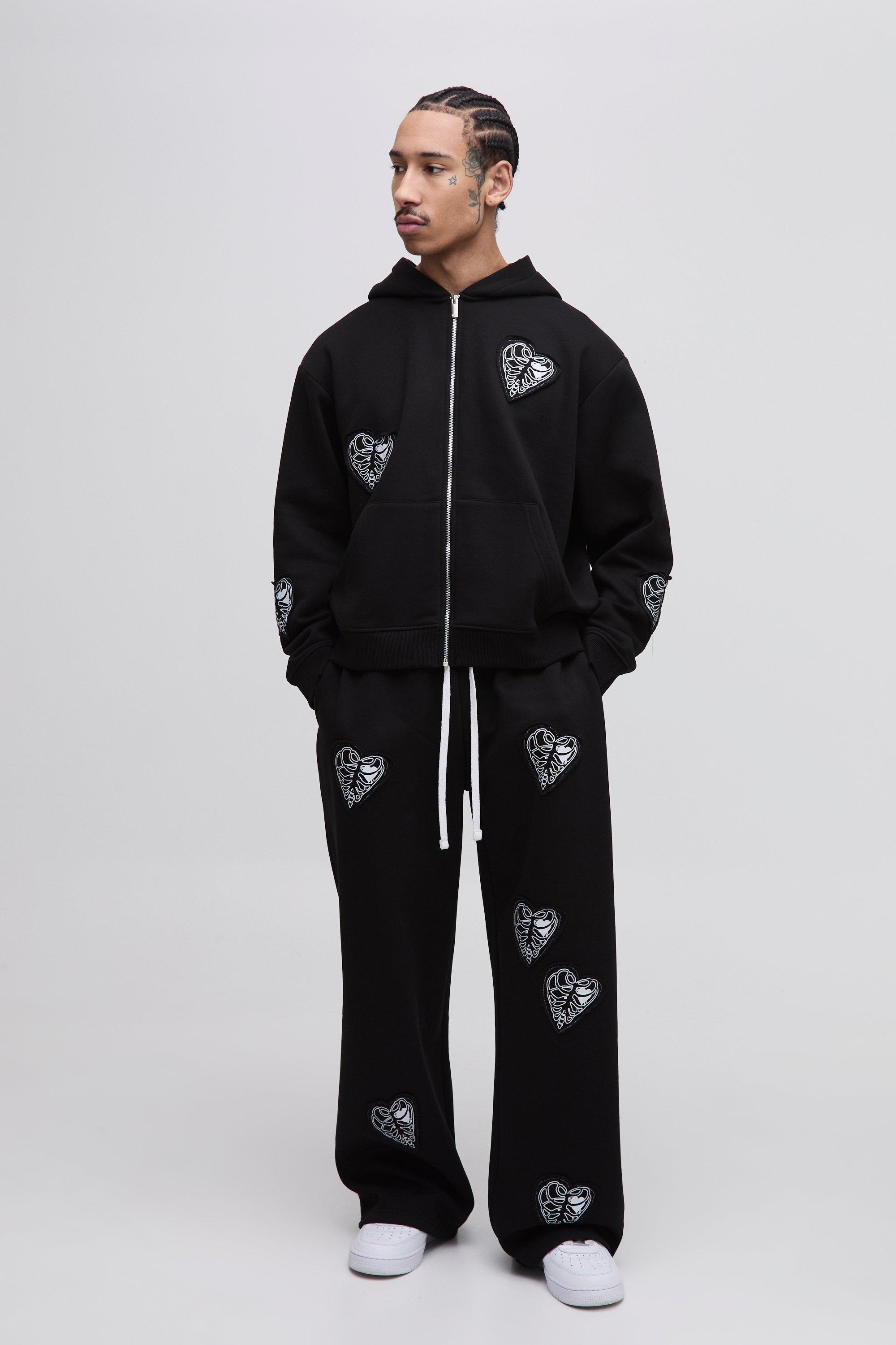 Tuta Sportiva Squadrata Oversize Con Zip A Gamba Ampia E Applique A Cuori, Nero