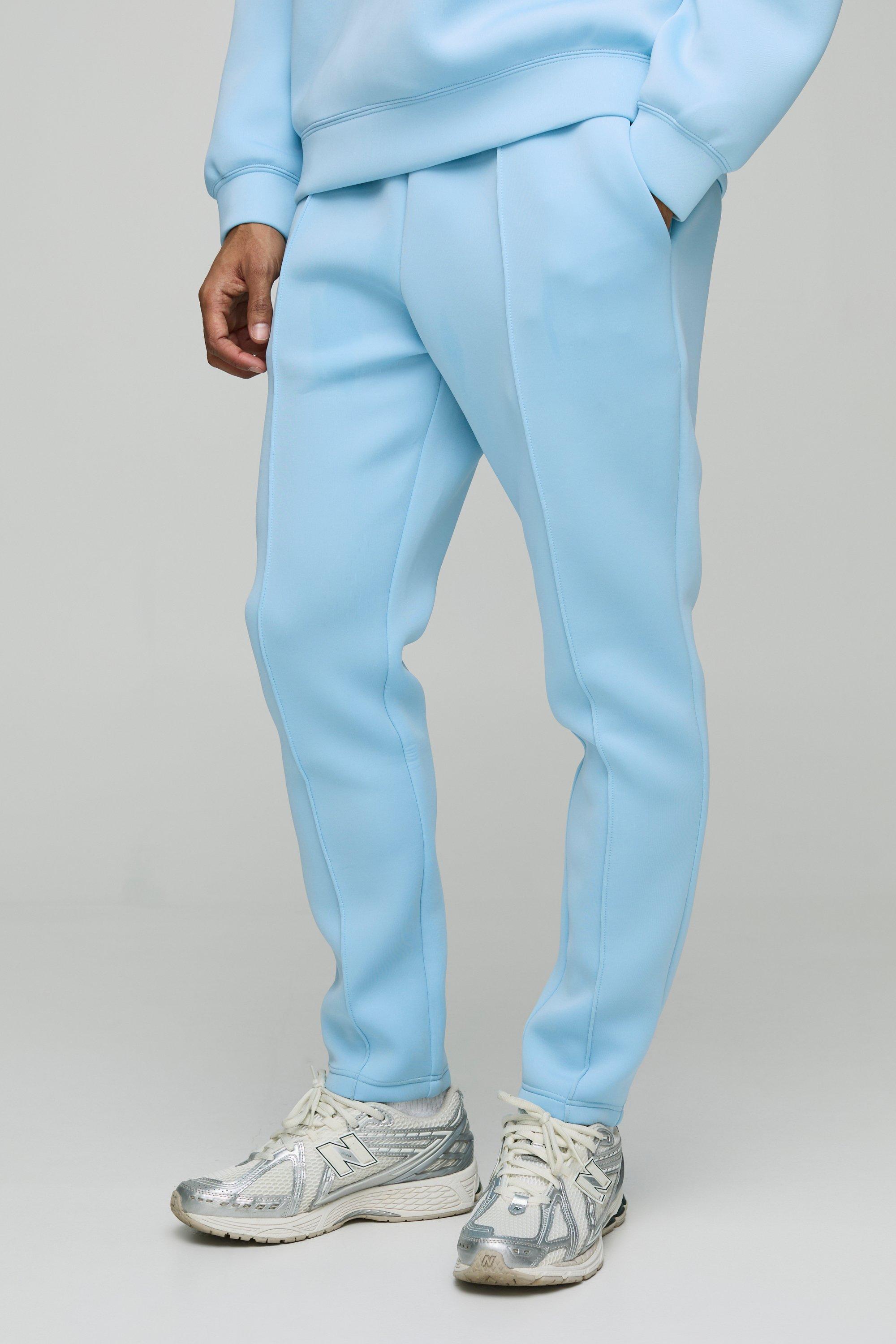 Image of Pantaloni tuta affusolati Slim Fit in Scuba rivestito, Azzurro