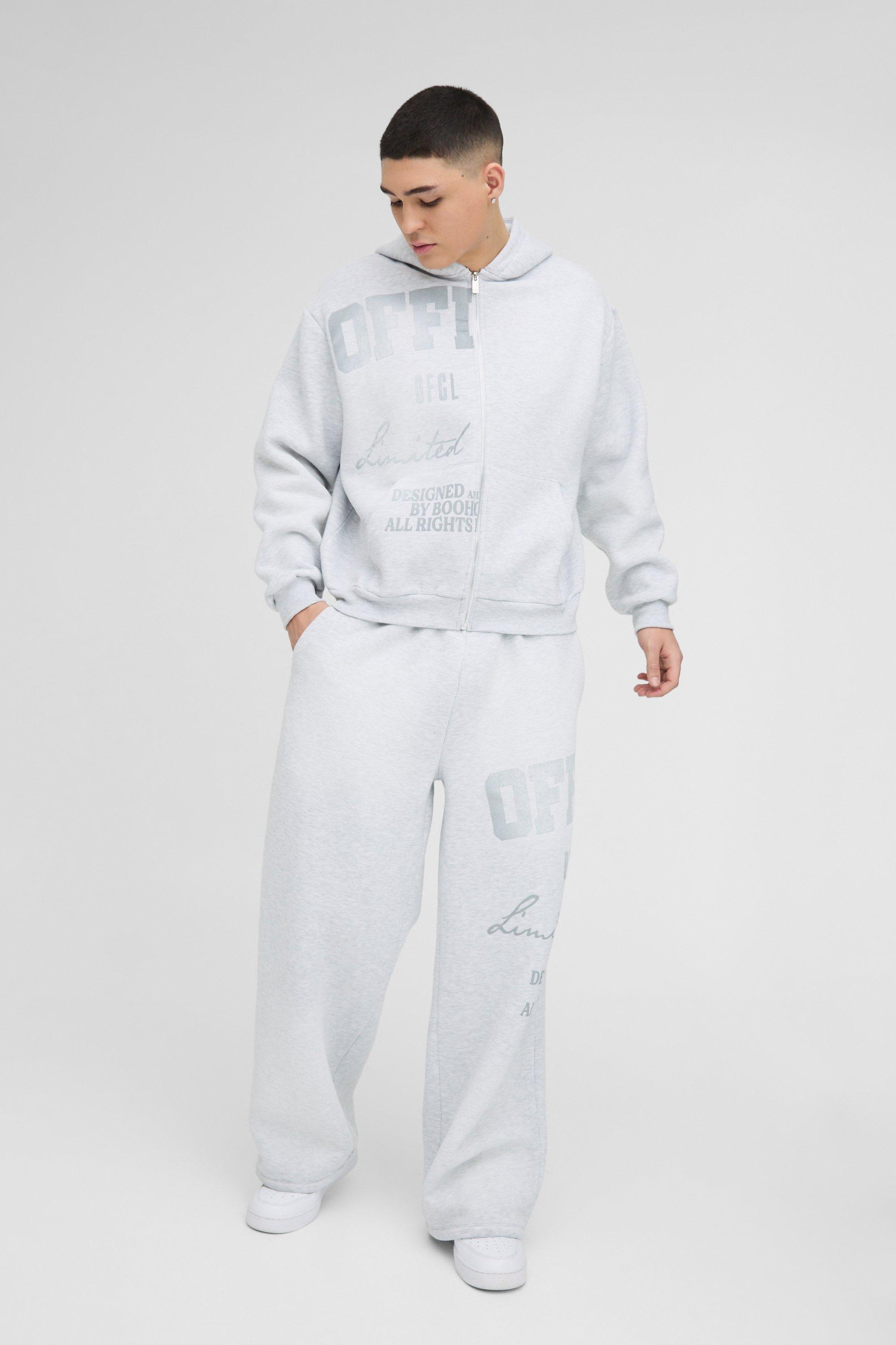 Tuta sportiva squadrata oversize Official a gamba ampia in lavaggio spray con stampa craquelé, Grigio