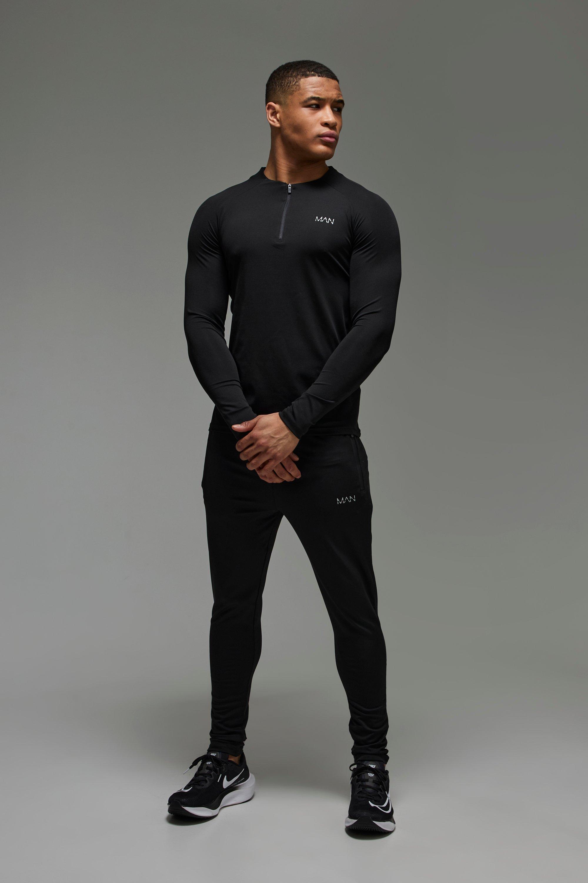 Tuta sportiva Man Active Skinny Fit a girocollo con zip corta, Nero