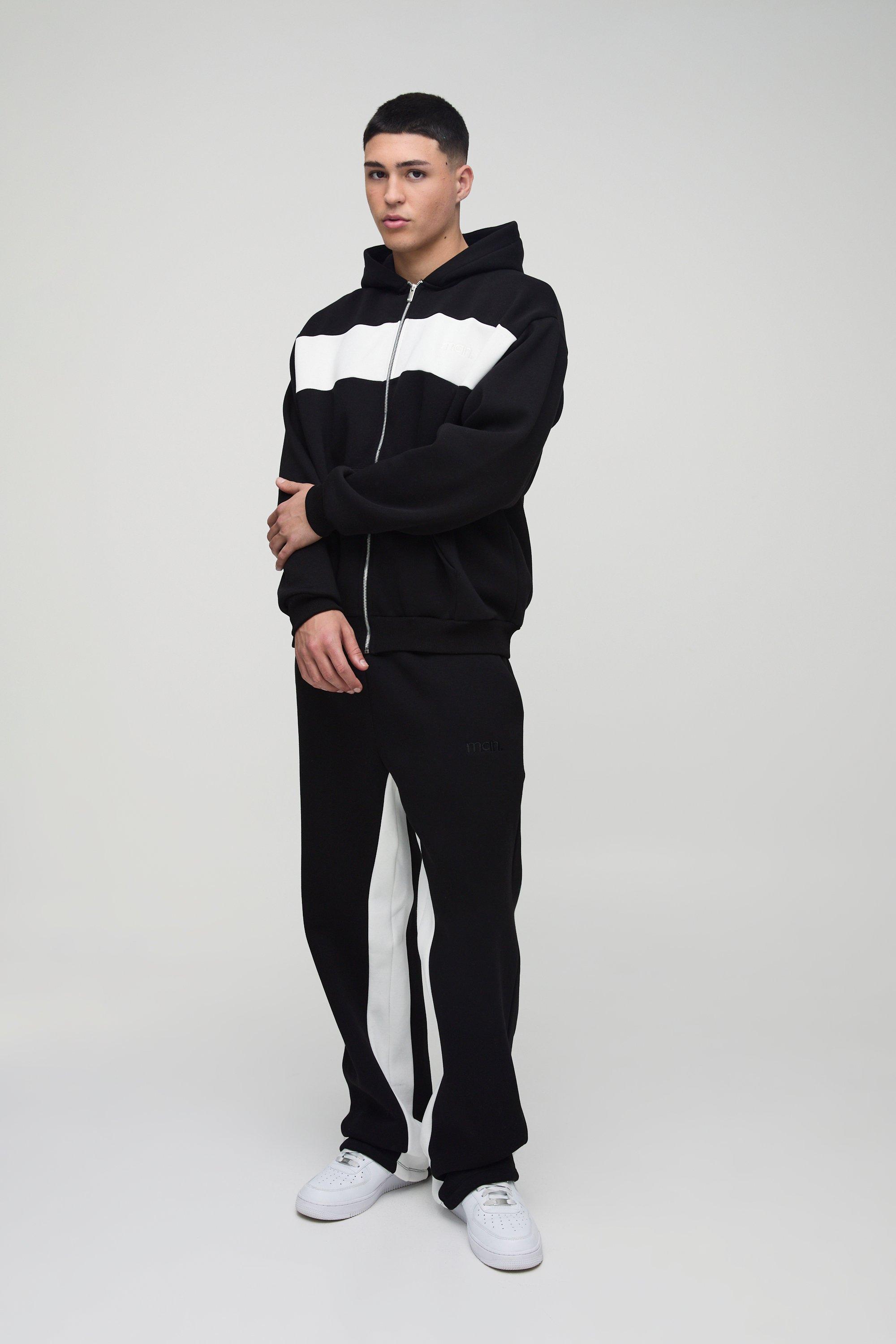 Tuta sportiva oversize Man a blocchi di colore con zip e cappuccio, Nero