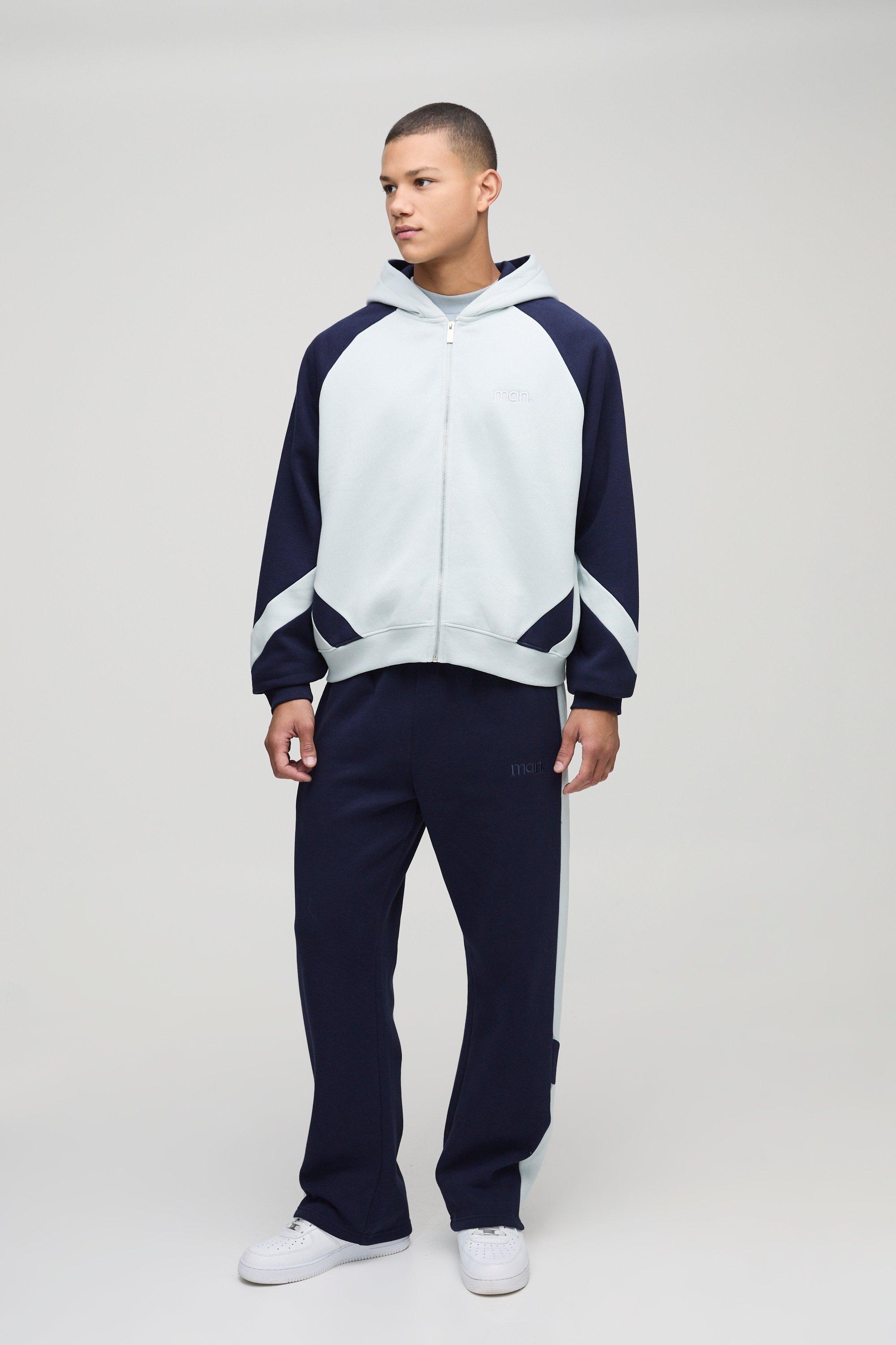 Tuta Sportiva Squadrata Oversize Man A Blocchi Di Colore Con Zip E Cappuccio, Azzurro