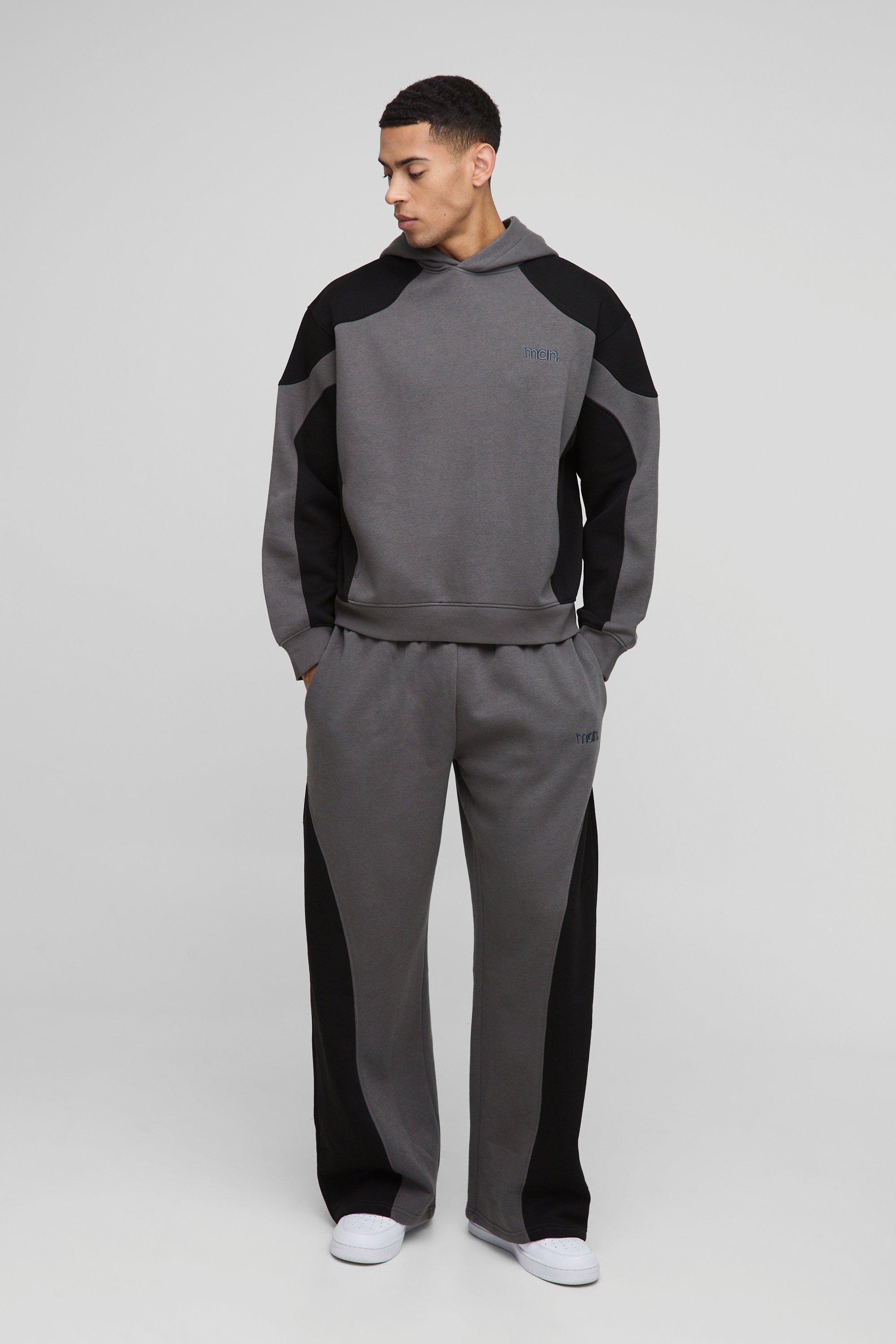 Tuta Sportiva Squadrata Oversize Man Con Cuciture E Cappuccio, Nero
