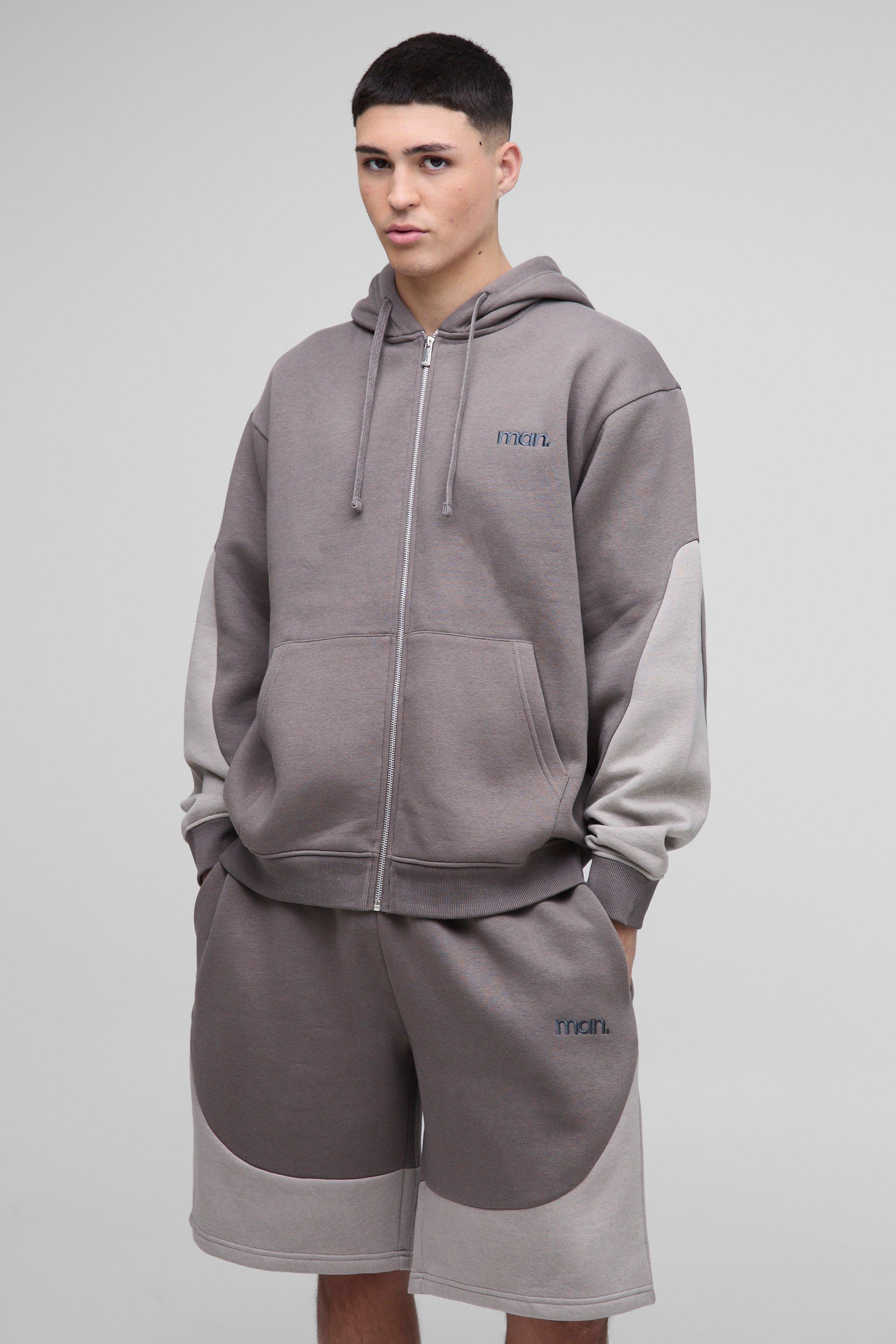 Tuta sportiva corta oversize Man a blocchi di colore con zip e cappuccio, Grigio