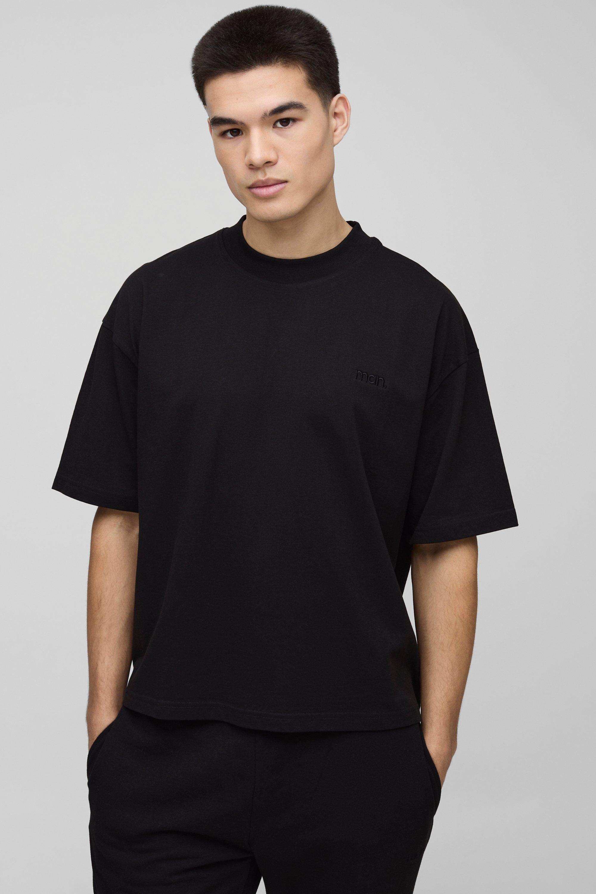 Image of Uomo. T-shirt squadrata oversize con girocollo esteso, Nero