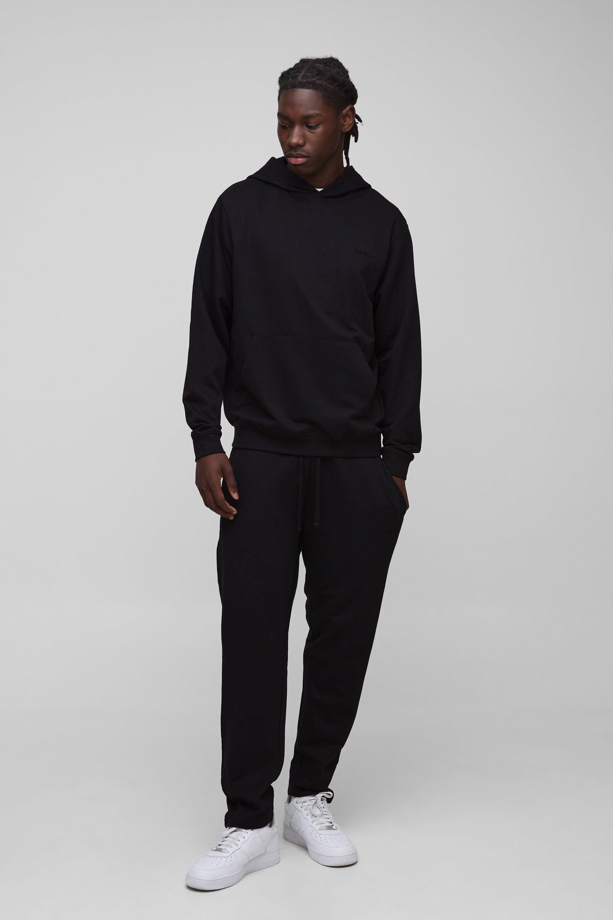 UOMO. Set felpa Basic leggera con cappuccio ampio e pantaloni tuta affusolati rilassati, Nero