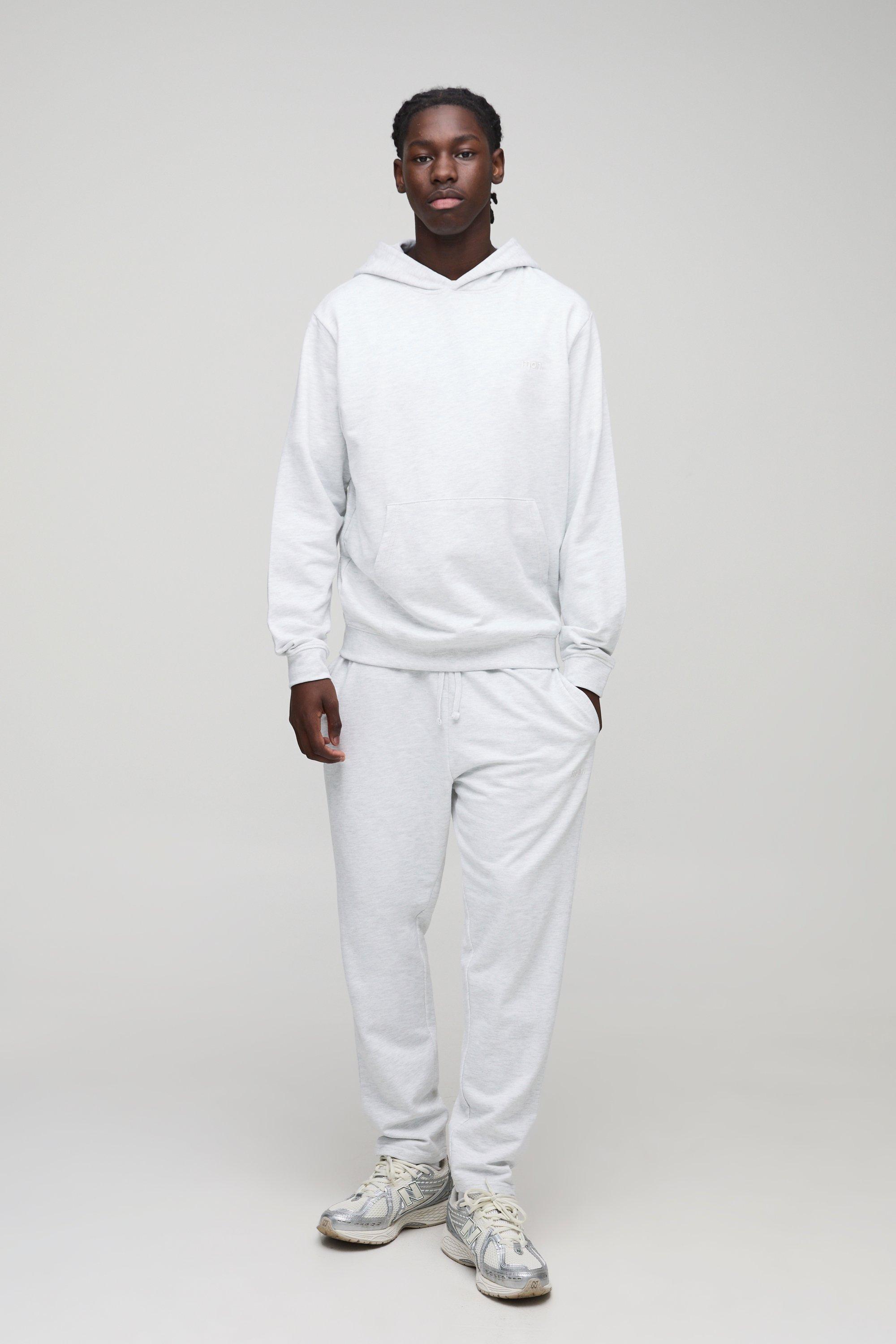UOMO. Set felpa Basic leggera con cappuccio ampio e pantaloni tuta affusolati rilassati, Grigio