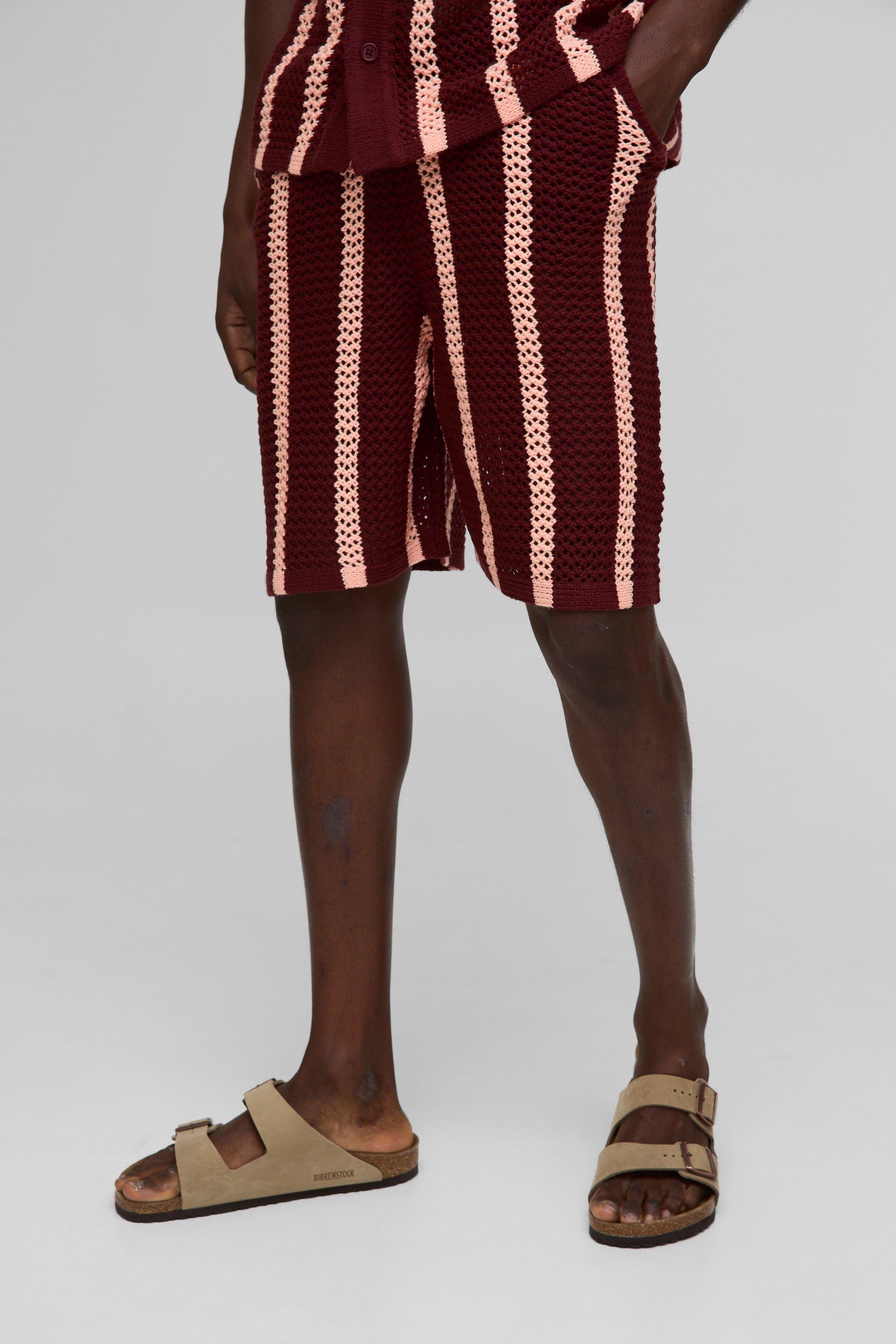 Image of Pantaloncini lunghi rilassati in maglia a righe traforati, Rosso