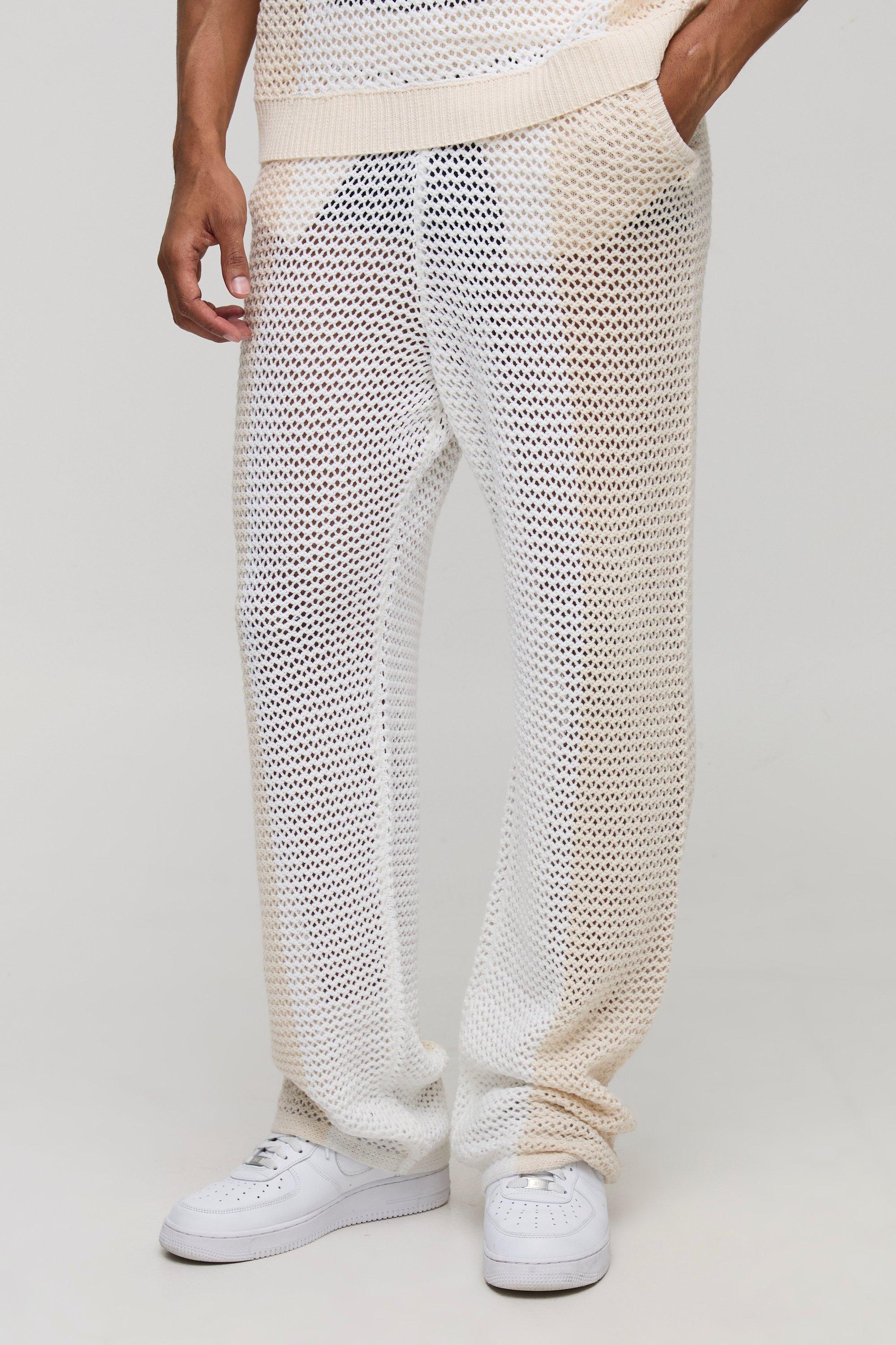 Image of Pantaloni tuta rilassati in maglia a blocchi di colore con cuciture aperte, Beige