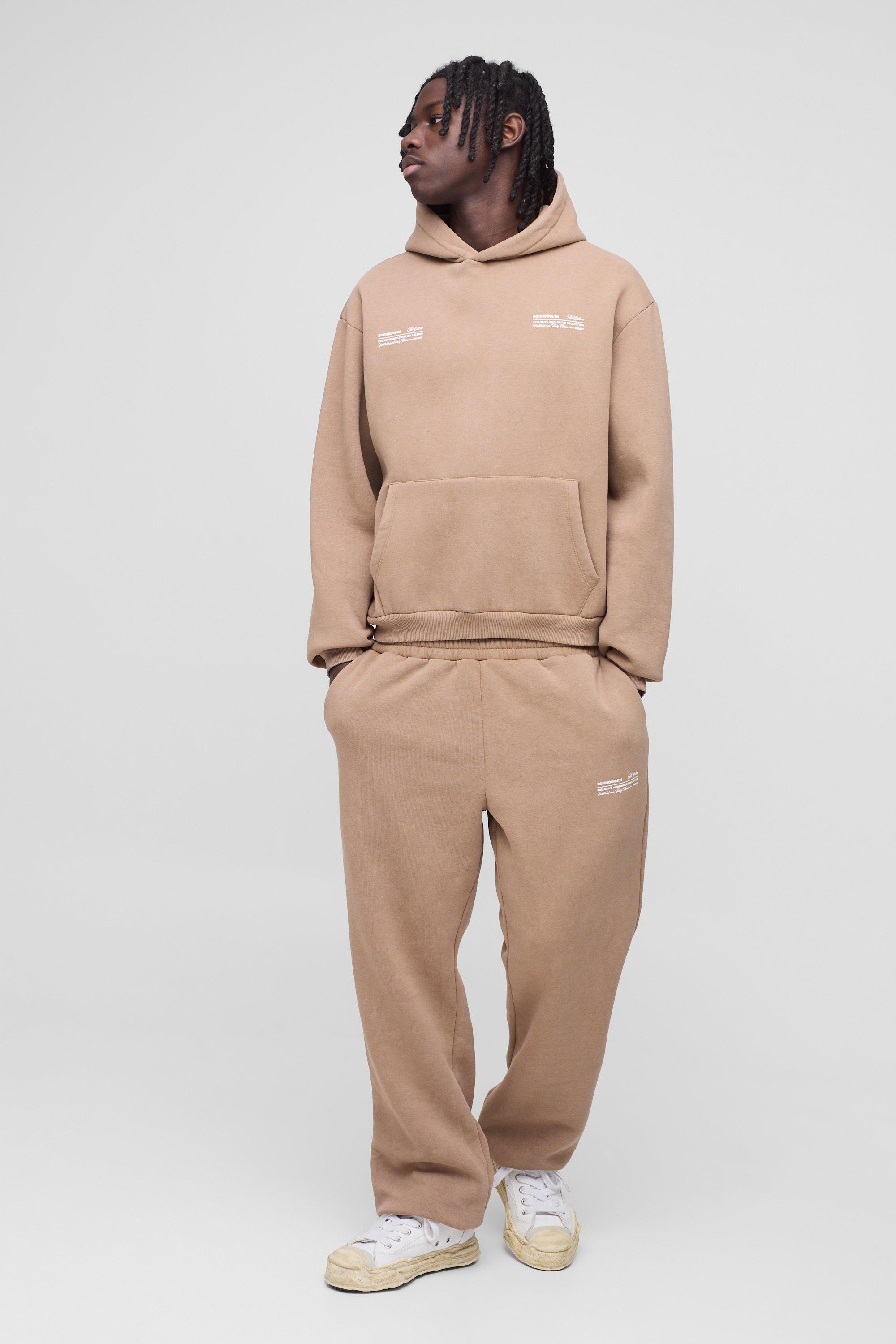 Image of Tuta sportiva squadrata oversize in lavaggio Man con cappuccio, Brown