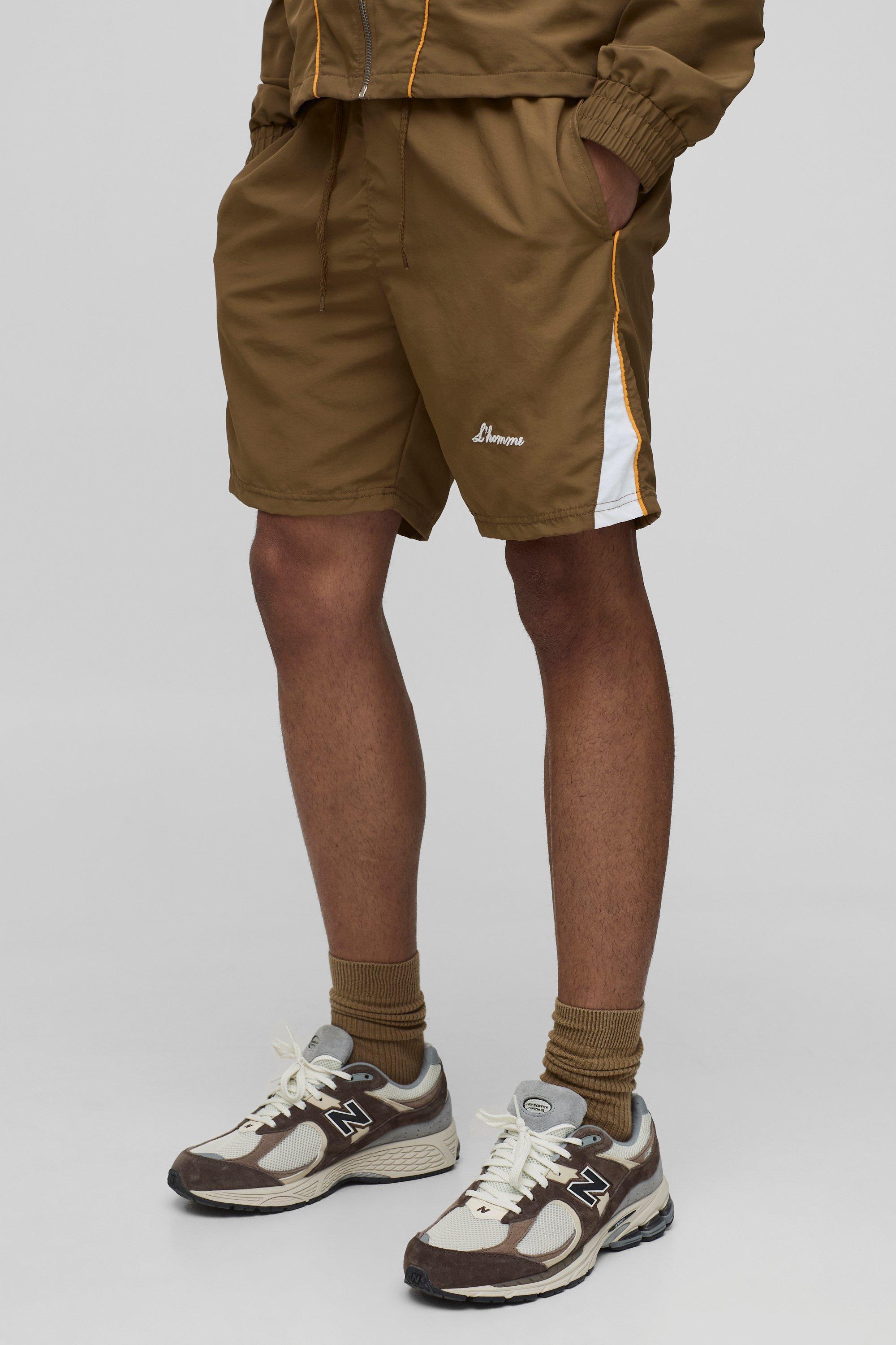 Image of Pantaloncini a blocchi di colore elasticizzati effetto goffrato, Brown