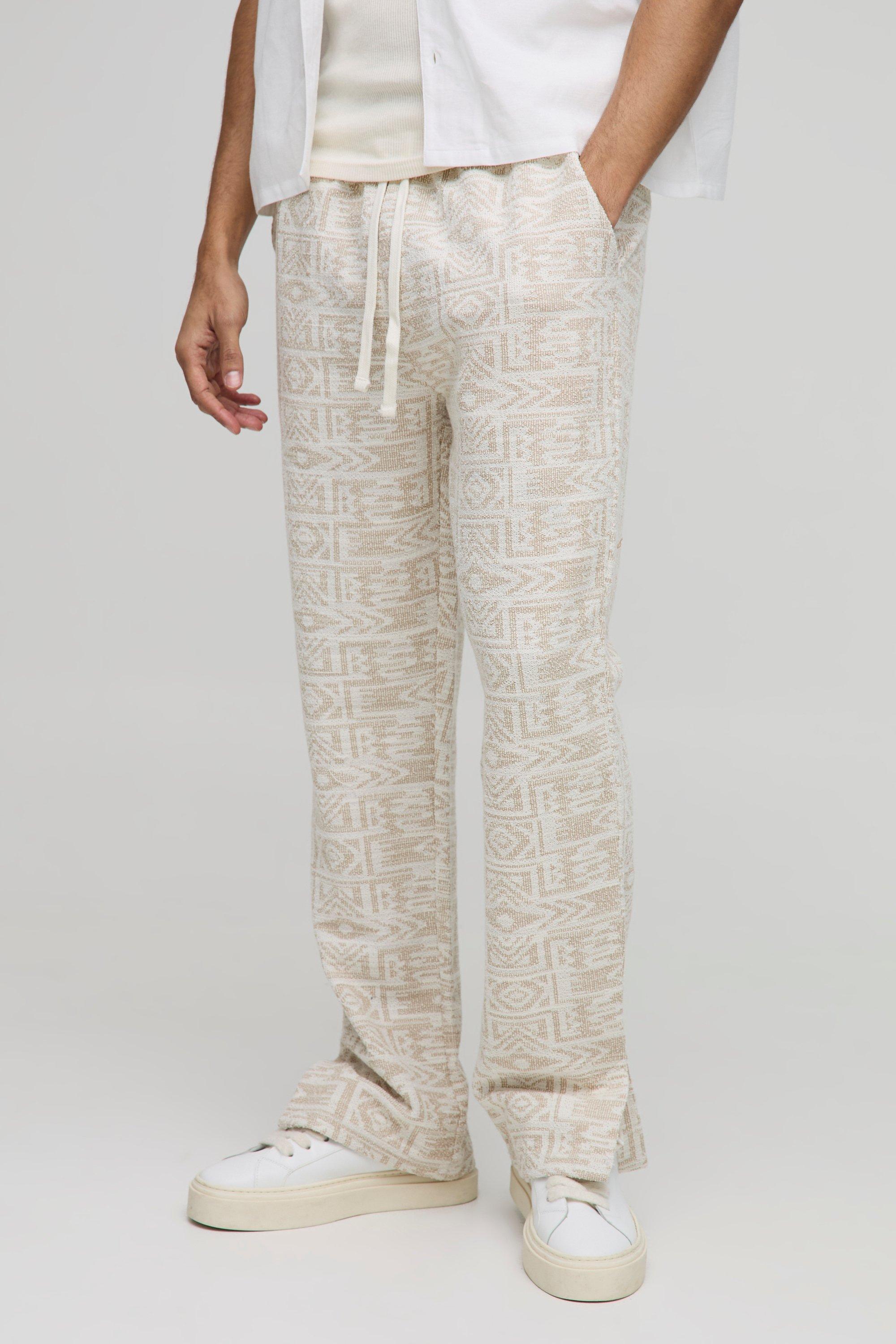 Image of Pantaloni tuta Regular Fit in jacquard con stampa azteca e spacco sul fondo, Tan