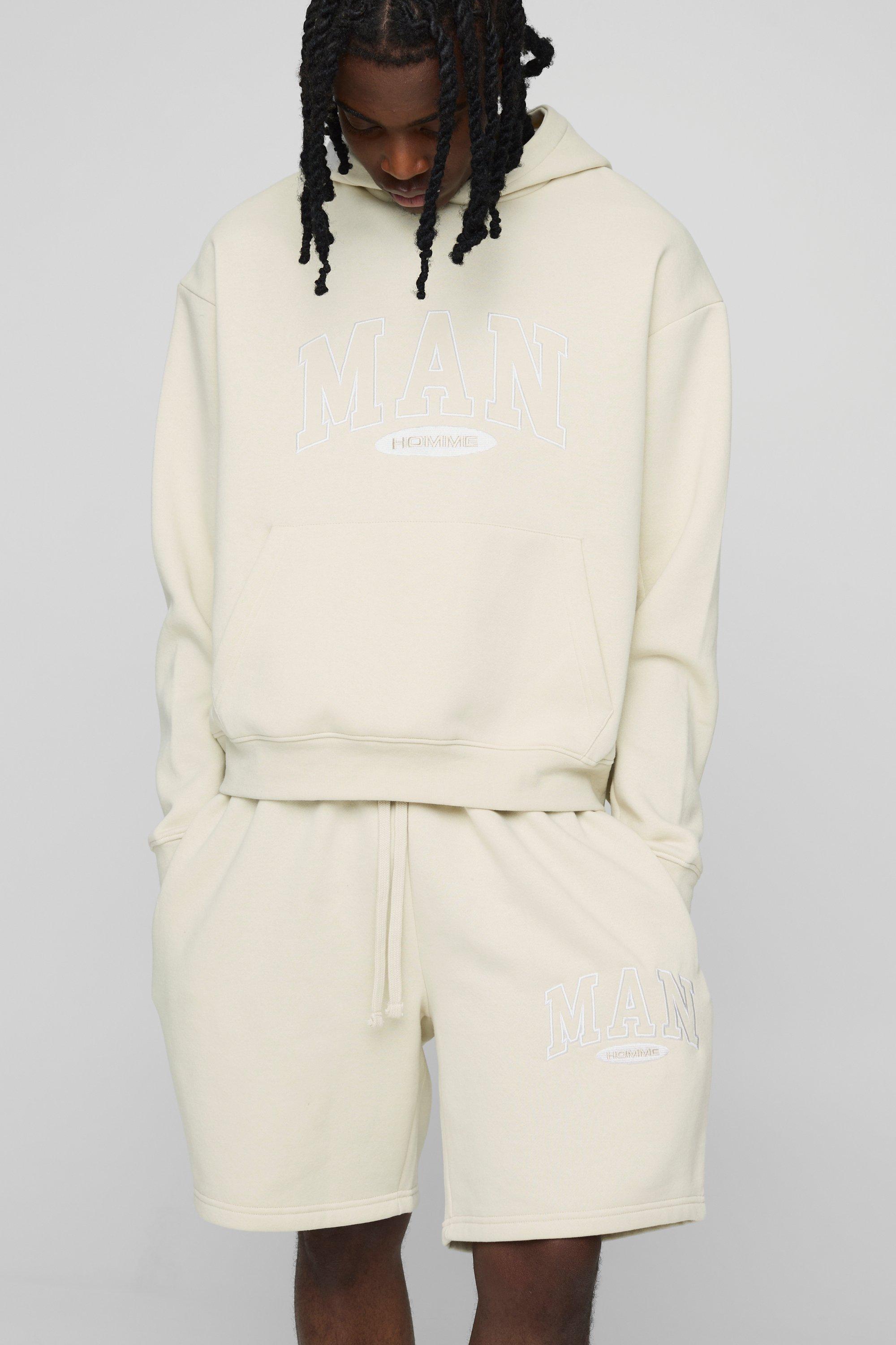 Image of Tuta sportiva corta oversize squadrata Man con cappuccio, Beige