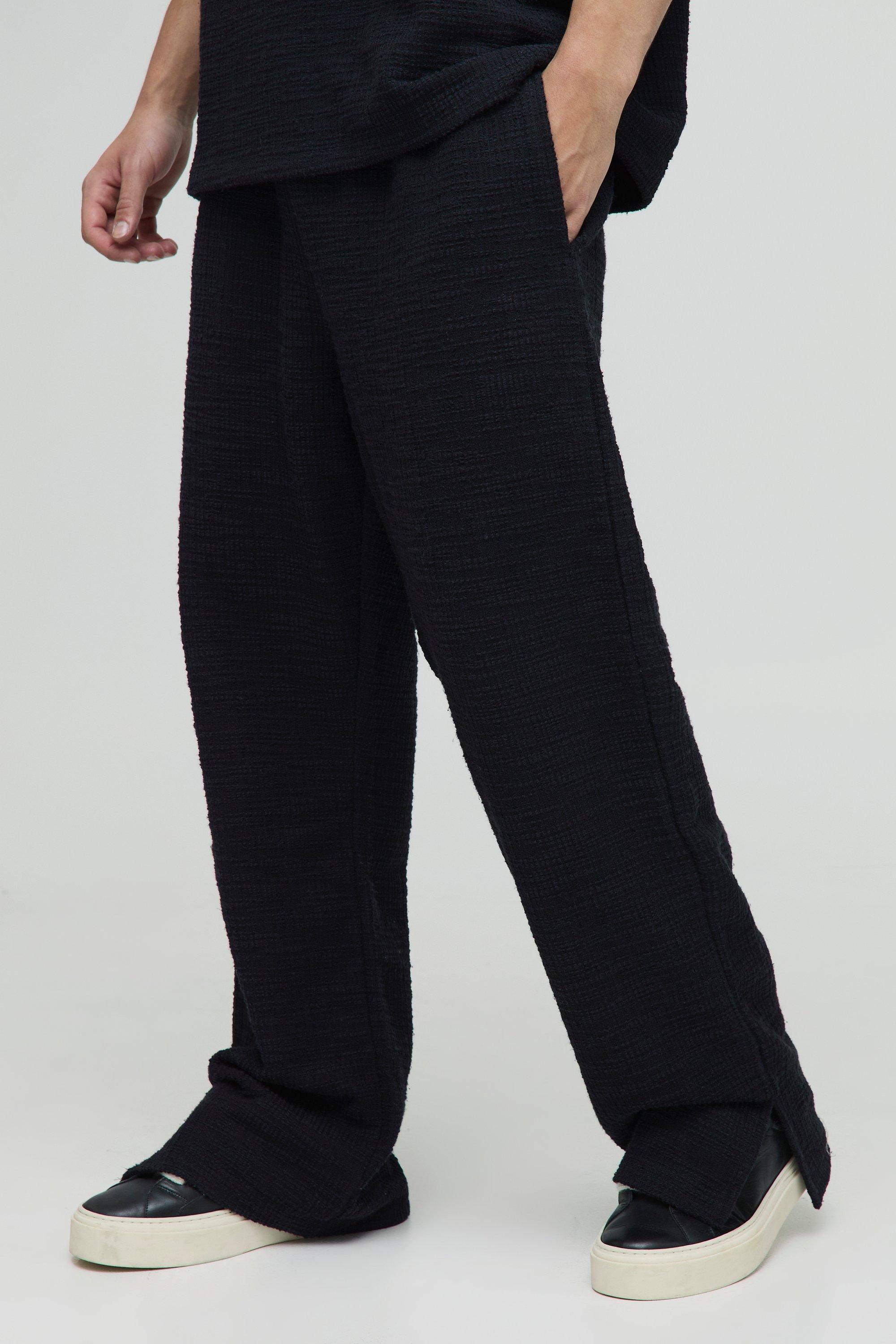 Image of Pantaloni tuta dritti con trama e spacco sul fondo, Nero