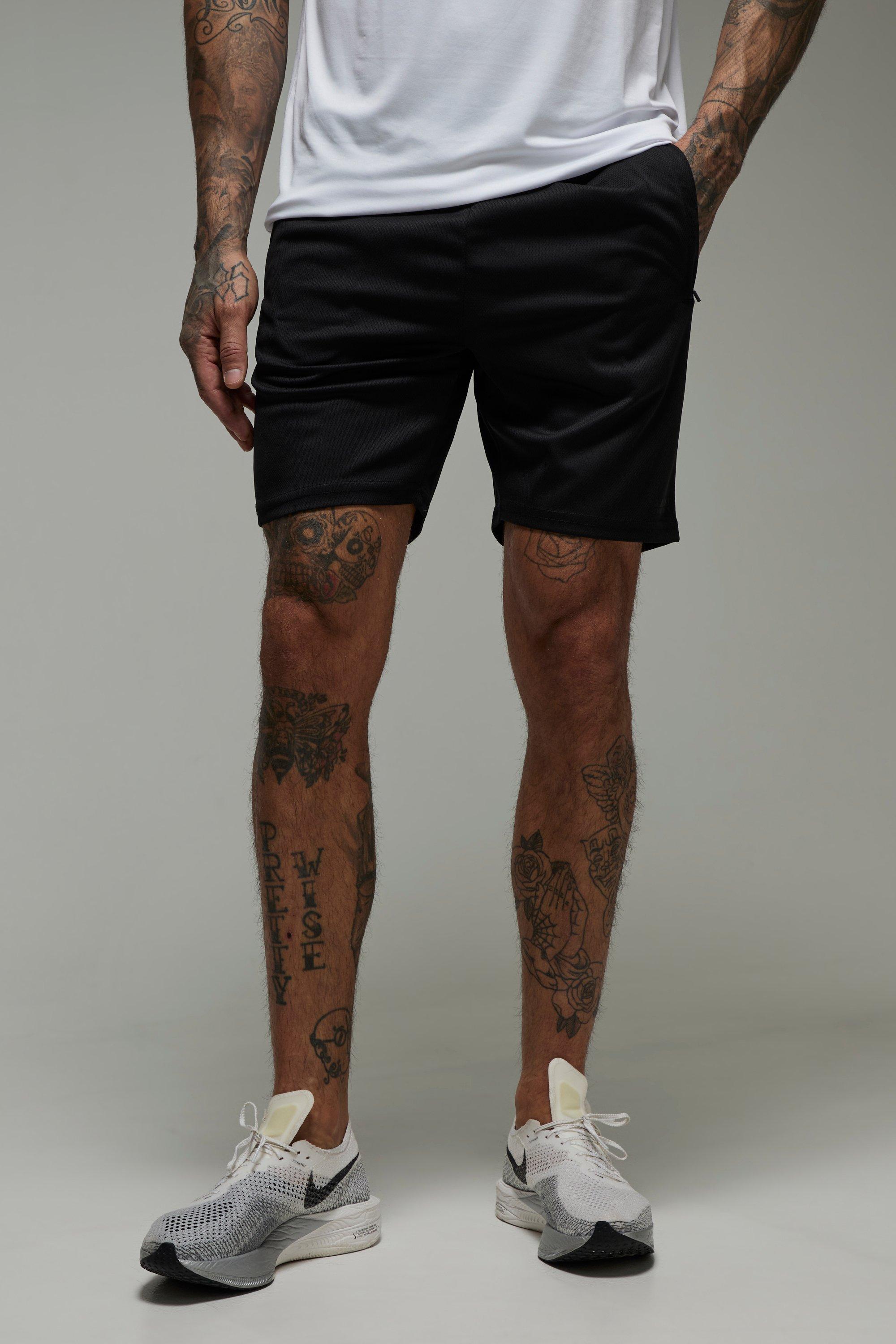 Image of Pantaloncini da palestra Tall Man Active da 7 pollici in Stretch con tasche e zip, Nero