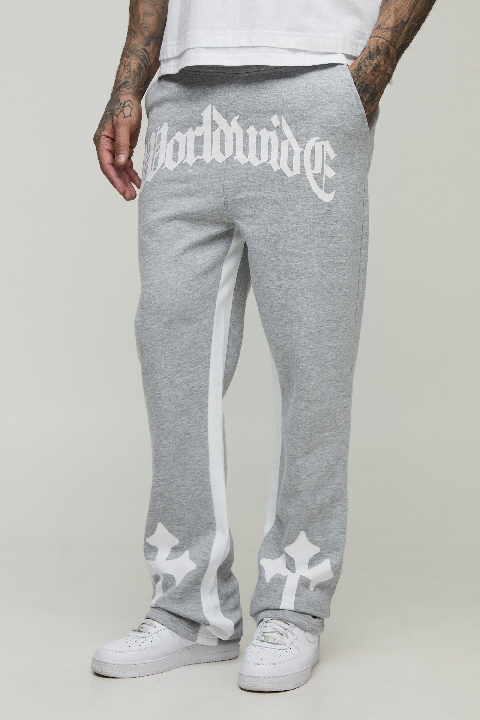 Image of Pantaloni tuta Tall Worldwide con stampa a croce, inserti a zampa, Grigio
