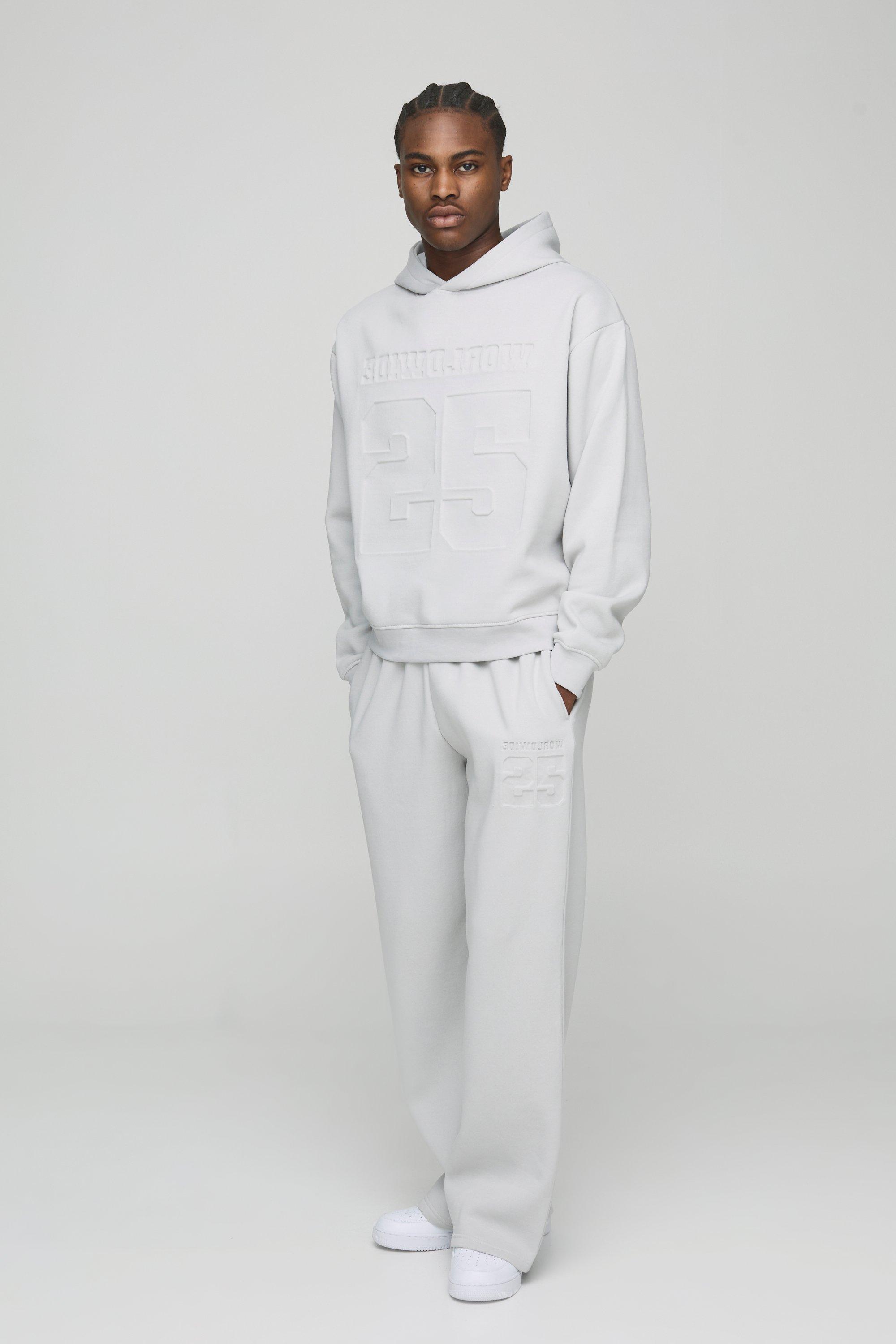 Image of Tuta sportiva squadrata oversize stile Varsity con incisioni 25 e cappuccio, Grigio