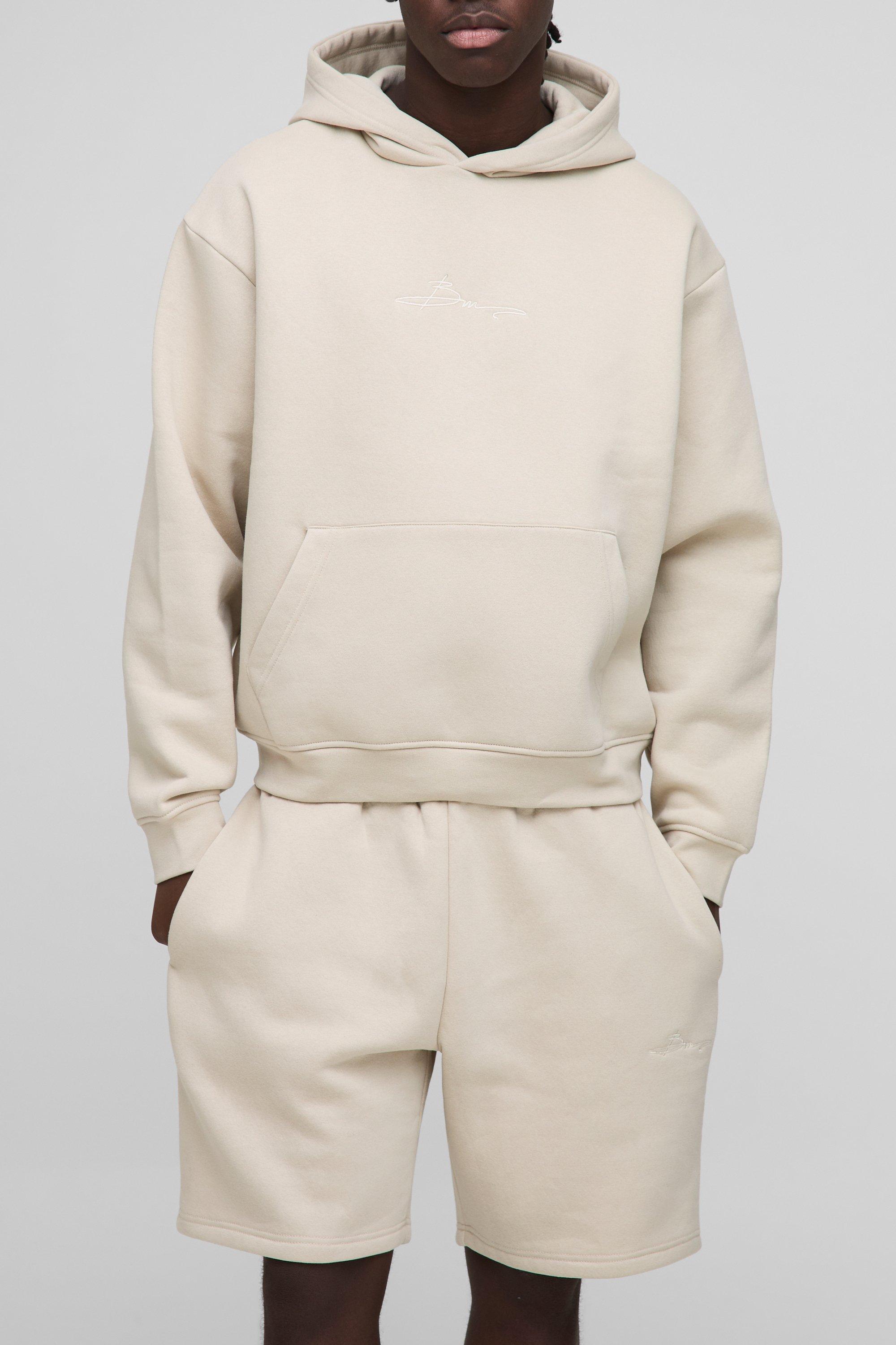 Image of Tuta sportiva corta oversize squadrata da 330 g/m² con firma BM e cappuccio, Beige