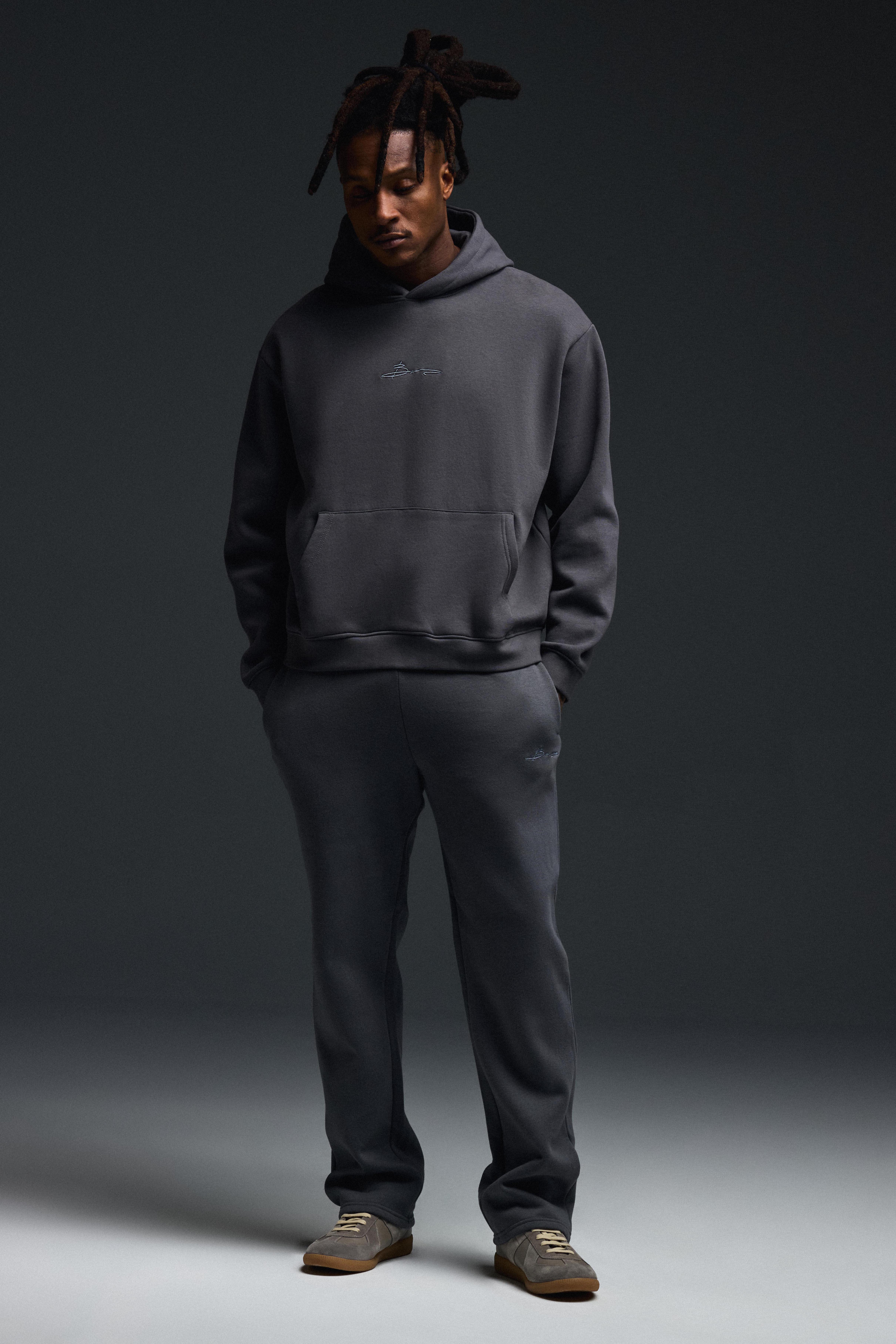 Image of Pantaloni tuta rilassati da 330 g/mq con firma BM, Grigio