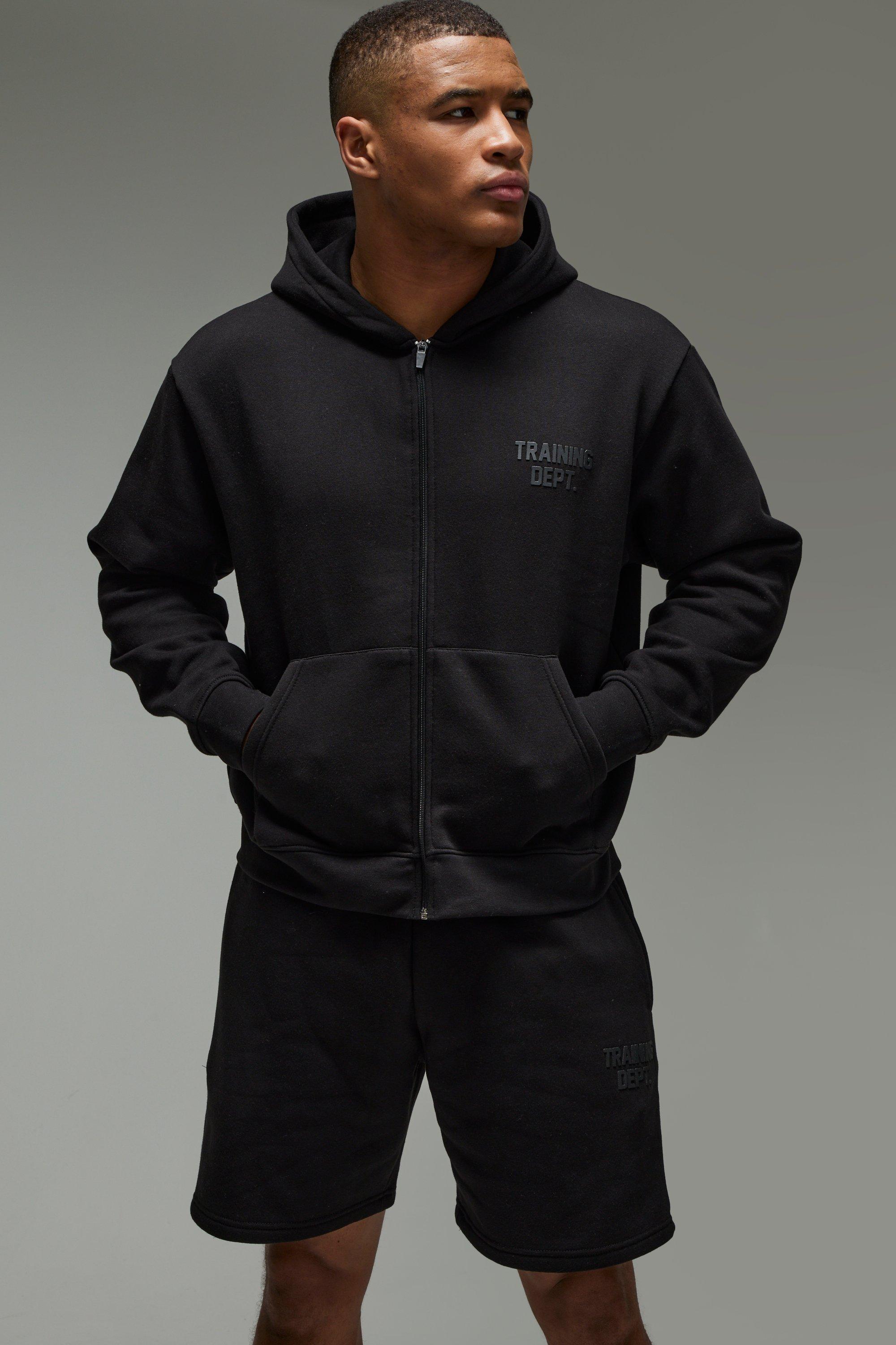 Image of Tuta sportiva squadrata oversize Training Dept con zip & pantaloncini, Nero