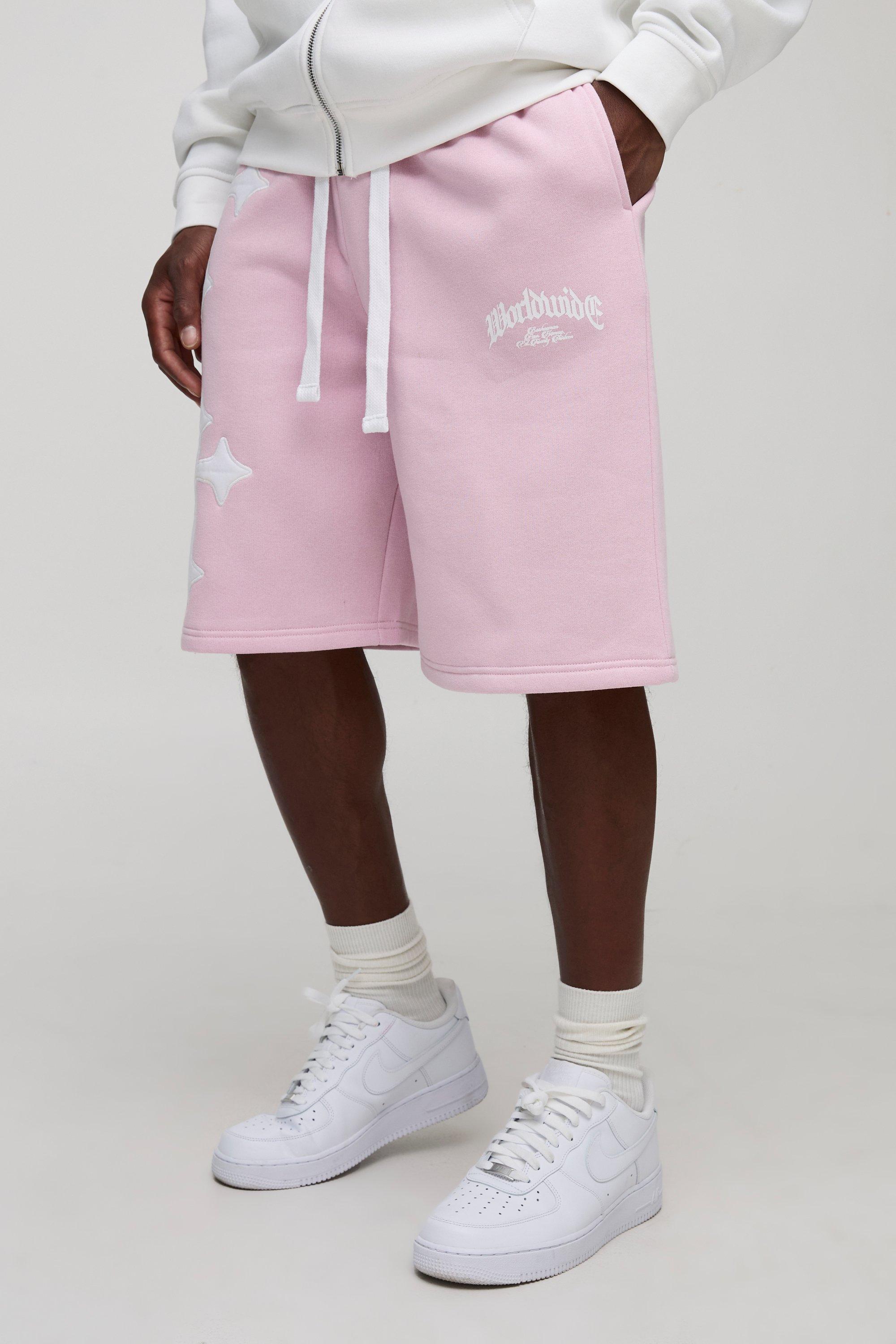 Mens Pink Oversized Worldwide Cross Long Length Shorts, Pink