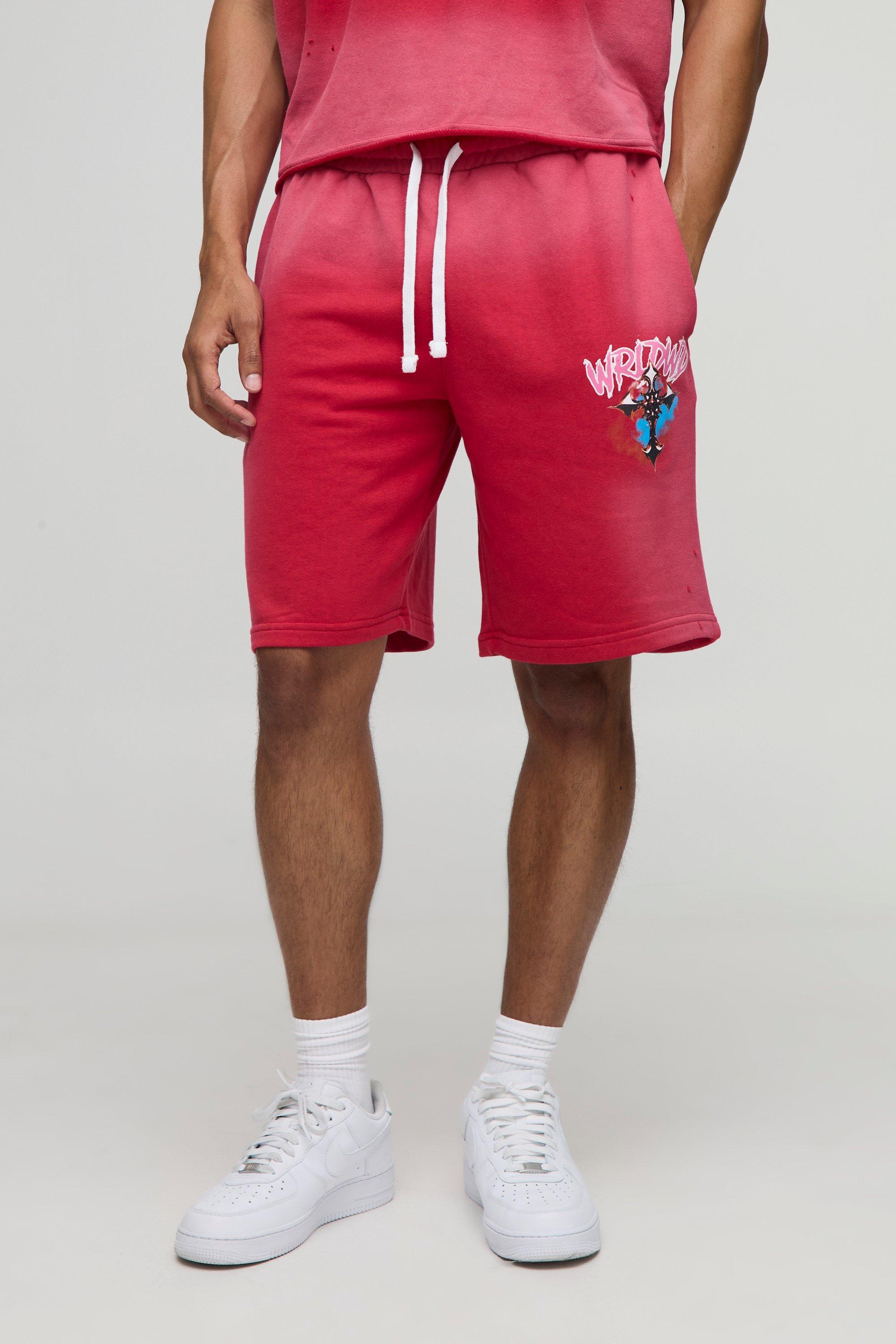Image of Pantaloncini oversize di media lunghezza slavati con grafica a croce e smagliature, Rosso