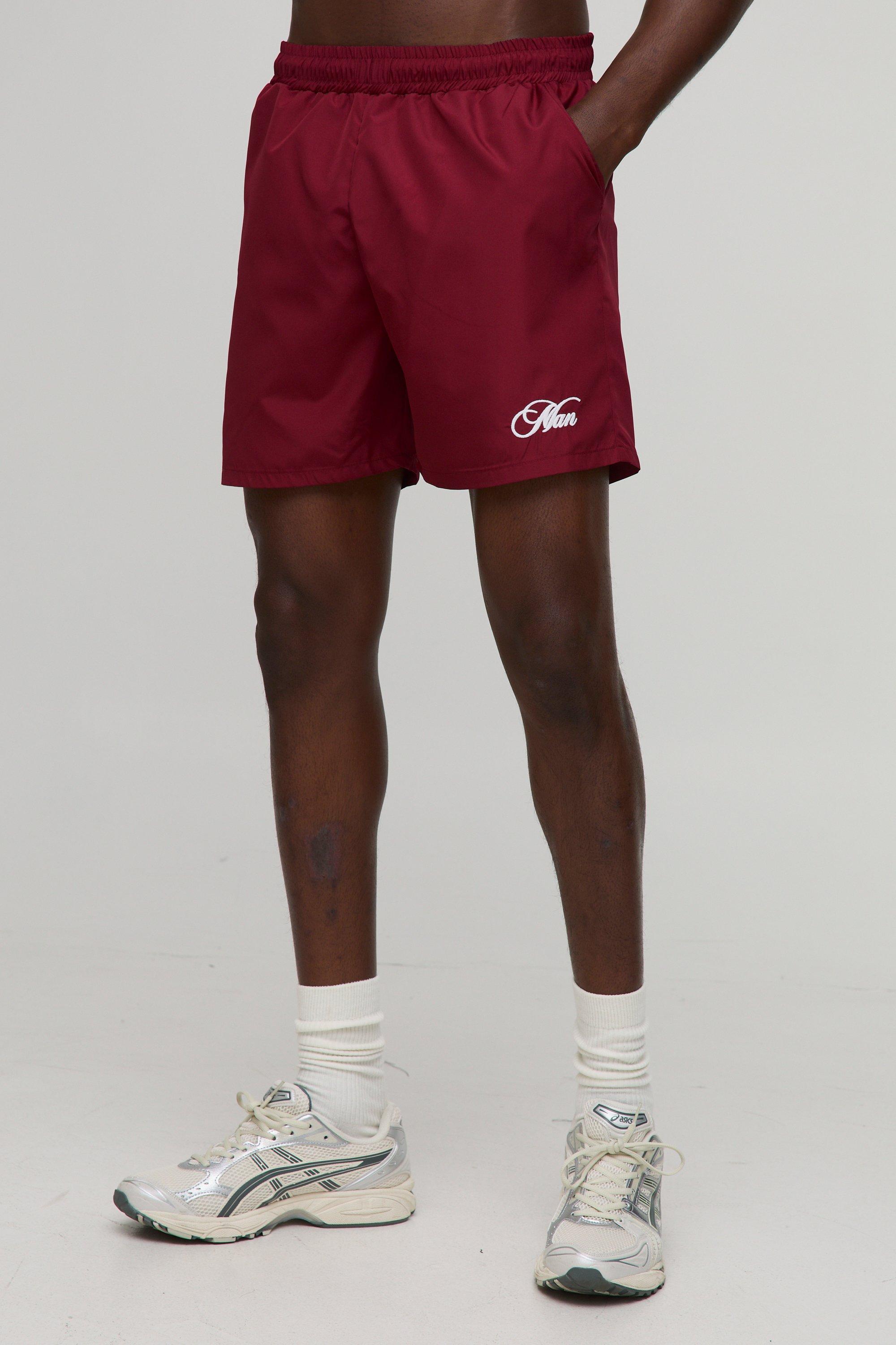 Branded Regular fit Mid length Embroidered Swim Shorts