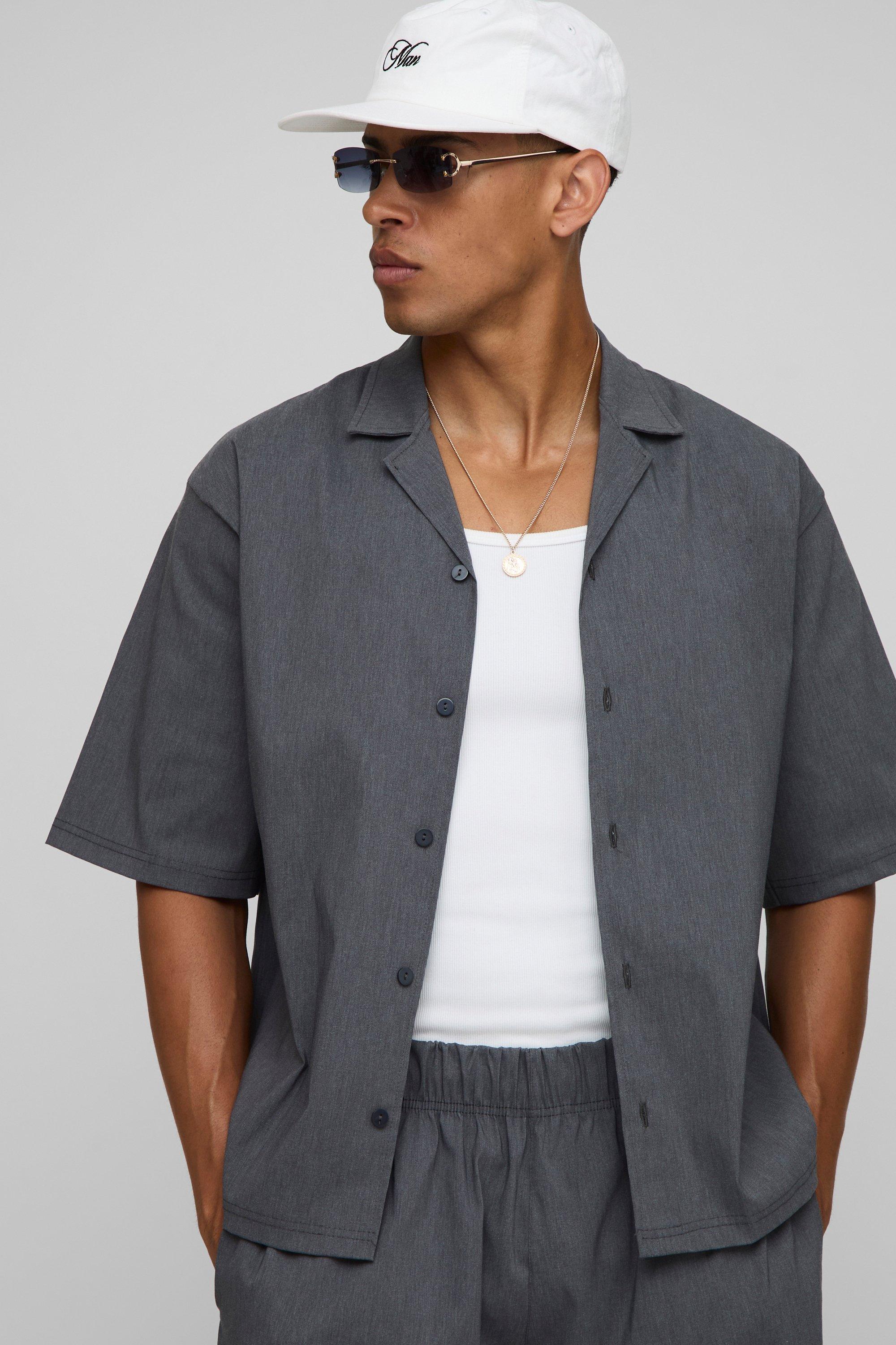 Image of Camicia oversize in mélange Tech Stretch con rever e rever, Grigio