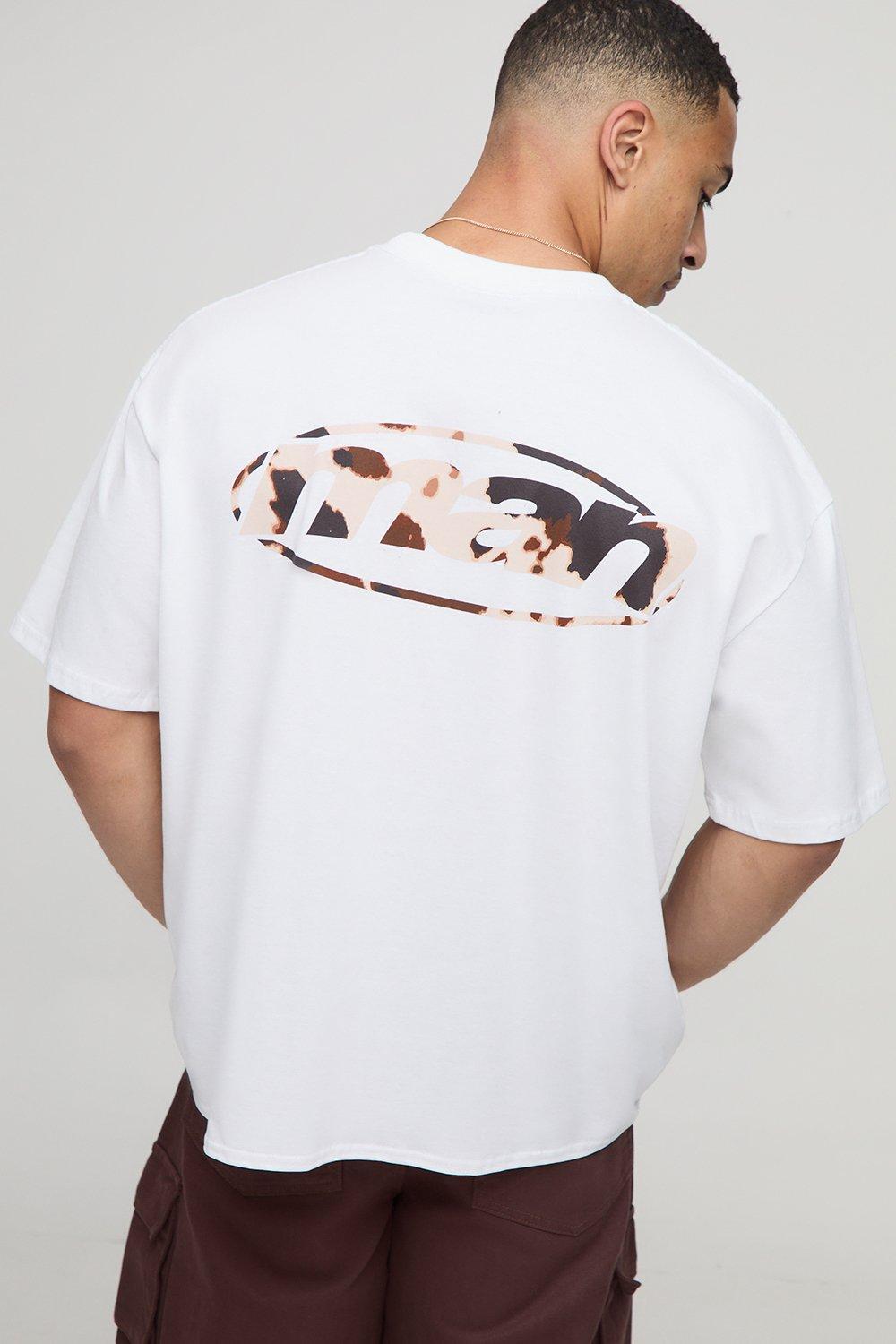 Image of White Oversized Boxy Cow Print Man Oval Graphic T-Shirt, Bianco
