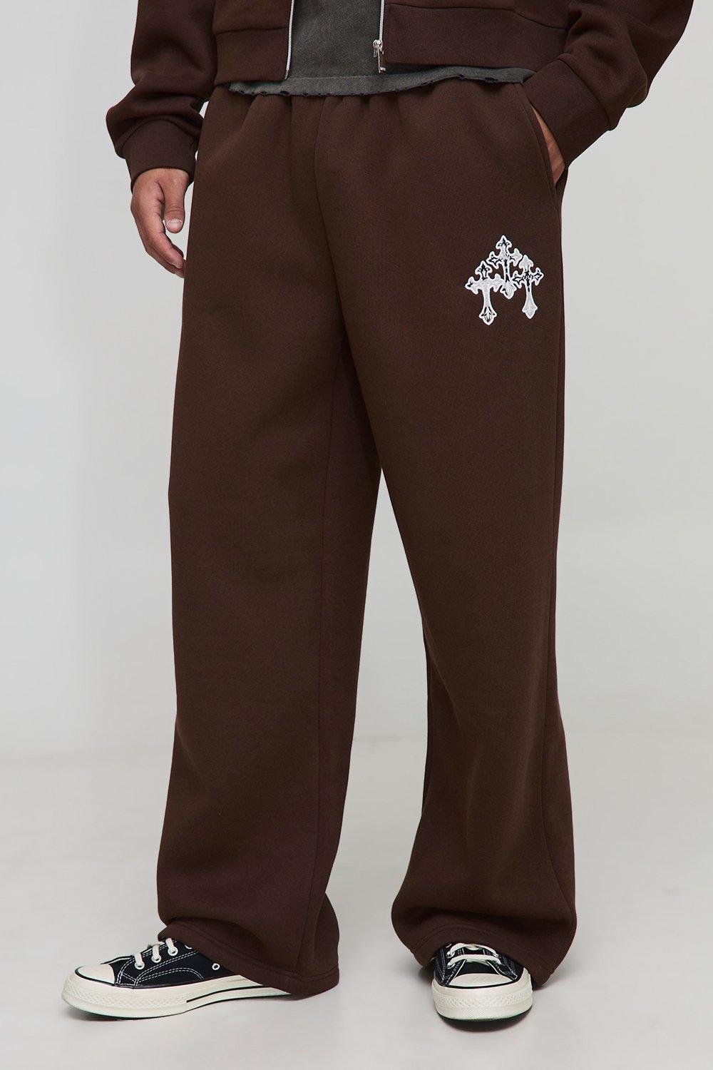 Mens Brown Wide Leg Cow Print Cross Applique Joggers, Brown