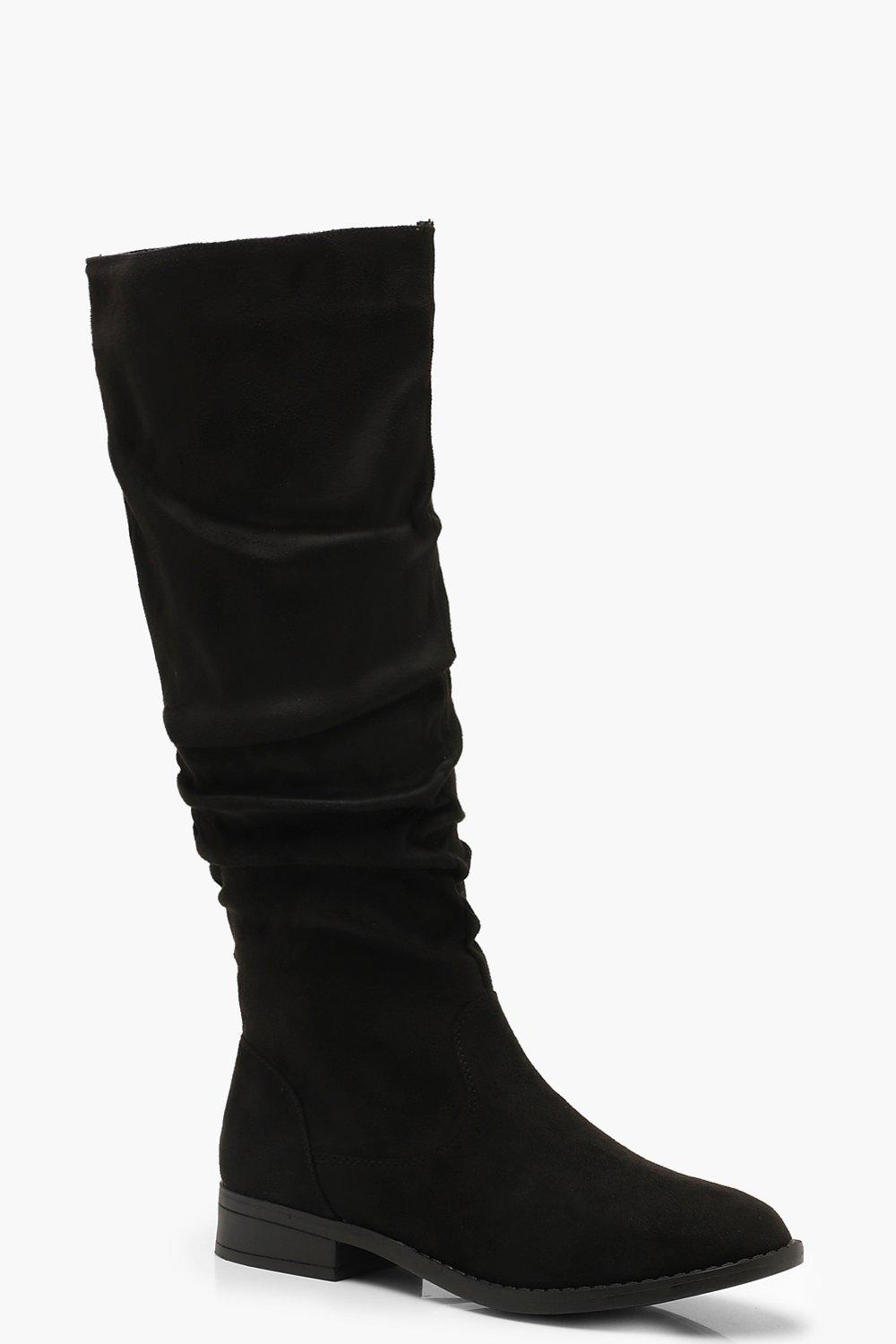 black flat knee high boots