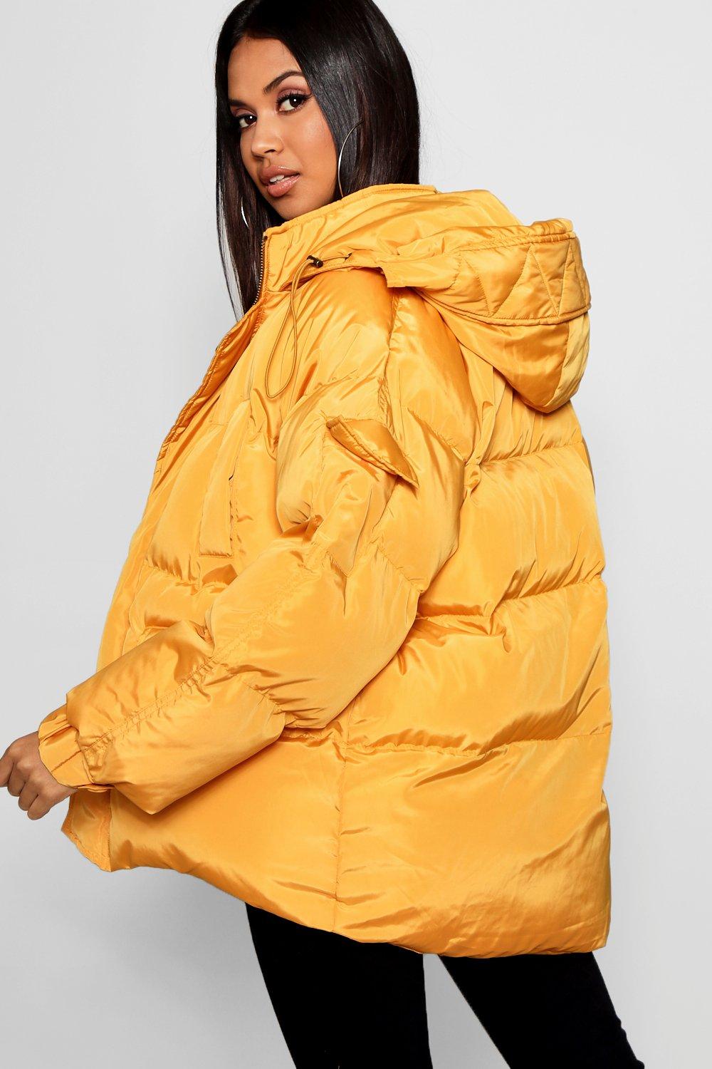 yellow hooded puffer jacket