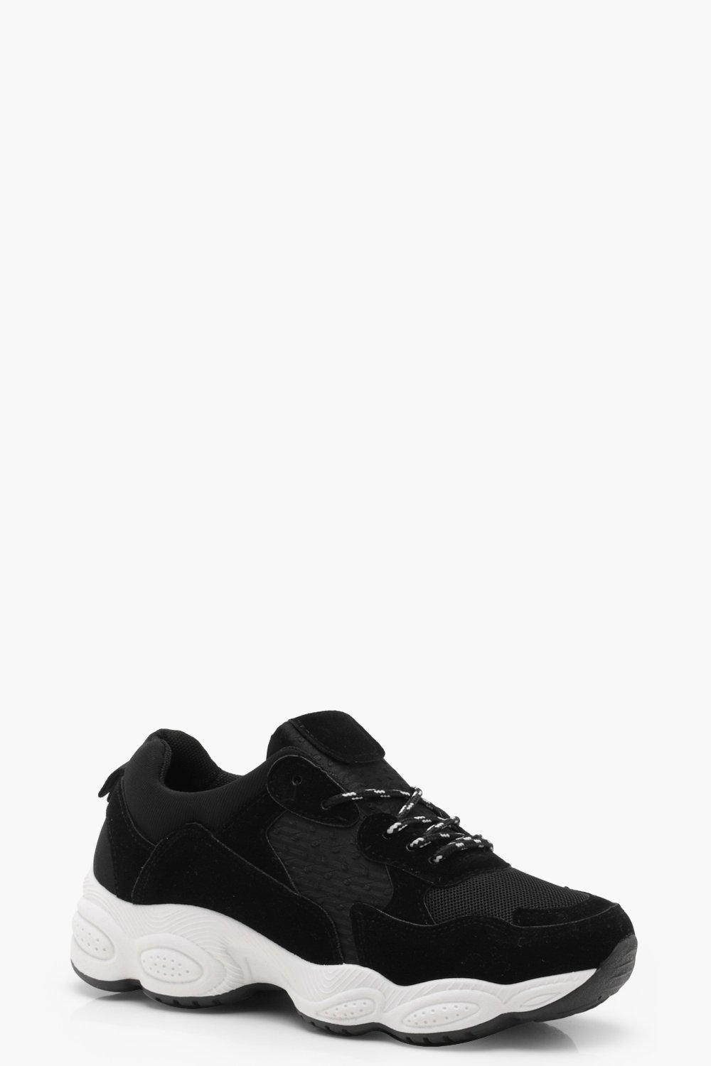 thick sole black trainers
